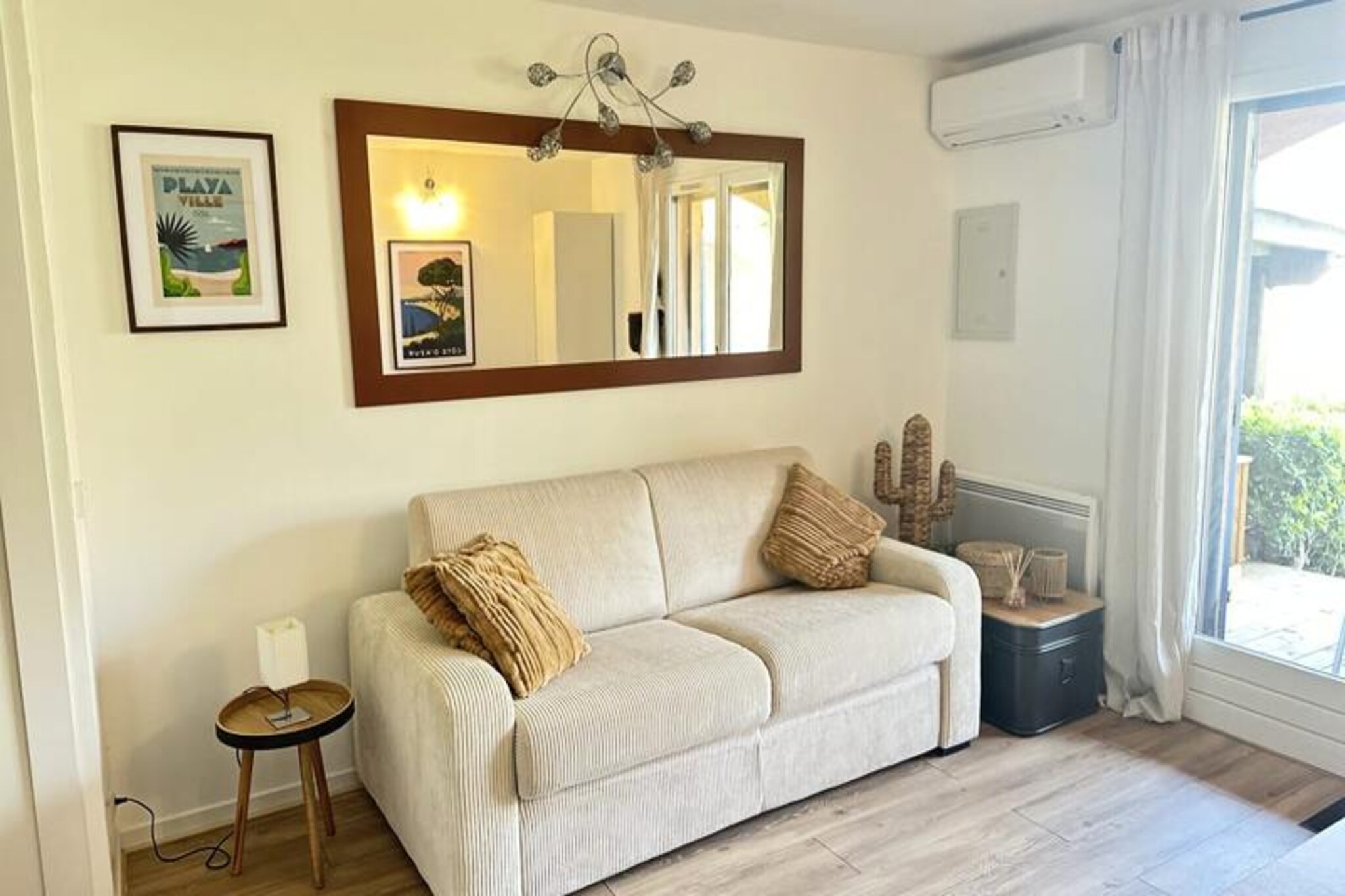 Perched on a sunlit hill overlooking the serene Saint-Clair district, this newly renovated apartment invites you to unwind amidst breathtaking sea views and Mediterranean charm. Imagine waking up to the gentle sound of waves and stepping onto a spacious terrace bathed in sunlight, where the sparkling blue waters of the coast stretch out before you. Whether you're seeking a romantic getaway or a tranquil family retreat, this property offers the perfect blend of comfort and elegance.  
                      Inside, the apartment is thoughtfully designed to accommodate up to 2 adults and 2 children or 3 adults, making it ideal for couples or small families. The air-conditioned interiors feature a stylish living room with a convertible sofa, a modern kitchen equipped with everything you need, and cozy sleeping arrangements. Renovated in February 2025, the space exudes freshness and contemporary flair. Towels, bed linens, and essentials are provided, ensuring a seamless arrival, while a private parking space adds convenience to your stay.  
                      Just 1.5 km from Le Lavandou, the Saint-Clair beach is a hidden gem renowned for its fine white sand and stunning views of the Golden Islands, including Port Cros and Le Levant. Nicknamed \