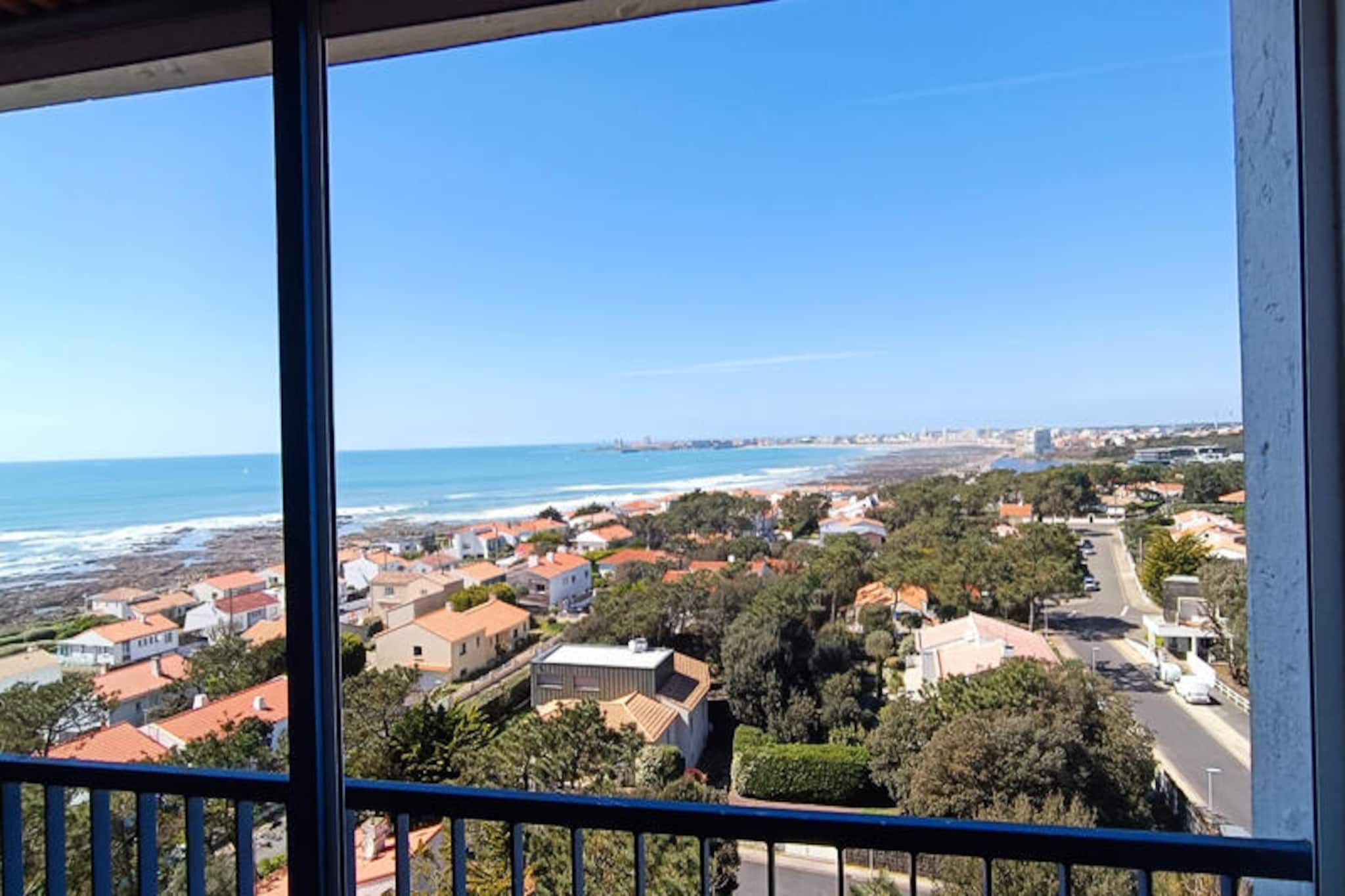 Perched on the 8th and top floor of a delightful residence, this 3-star apartment offers a serene retreat with breathtaking views of the bay of Les Sables d'Olonne. Whether you're traveling with family or friends, this 70m² haven is designed to provide a perfect blend of comfort and coastal charm. Just 500 meters from the golden sands of Tanchet Beach and its tranquil lake, you'll find yourself immersed in the natural beauty of the Vendée coastline. The nearby thalassotherapy center adds a touch of wellness to your stay, making it an ideal destination for relaxation and rejuvenation.
Step inside to discover a thoughtfully designed space that caters to your every need. The apartment features a bright living and dining area that opens onto a balcony, where you can savor the stunning sea views over a morning coffee or an evening glass of wine. The fully equipped kitchen is a culinary enthusiast's dream, complete with modern appliances such as a refrigerator-freezer, dishwasher, washer-dryer, oven, microwave, and more. The sleeping arrangements are equally inviting, with one bedroom overlooking the serene pine forest and another offering a sea-facing balcony and two electric single beds that can be joined for added flexibility. A bathroom with a bathtub and a separate toilet ensure convenience for all guests. For those blending work and leisure, the office area provides a quiet space with inspiring ocean views.
The residence offers practical amenities, including an outdoor parking space and a private cellar for storing bicycles, perfect for exploring the scenic surroundings. The concierge service ensures a smooth check-in and check-out experience, and optional extras like linens and towels can be arranged for your convenience.
With its unbeatable location near the beach, lake, and wellness facilities, this apartment invites you to unwind and create lasting memories. Whether you're soaking in the panoramic views, cycling along coastal trails, or indulging in local seafood delicacies, your stay promises to be as relaxing as it is unforgettable.