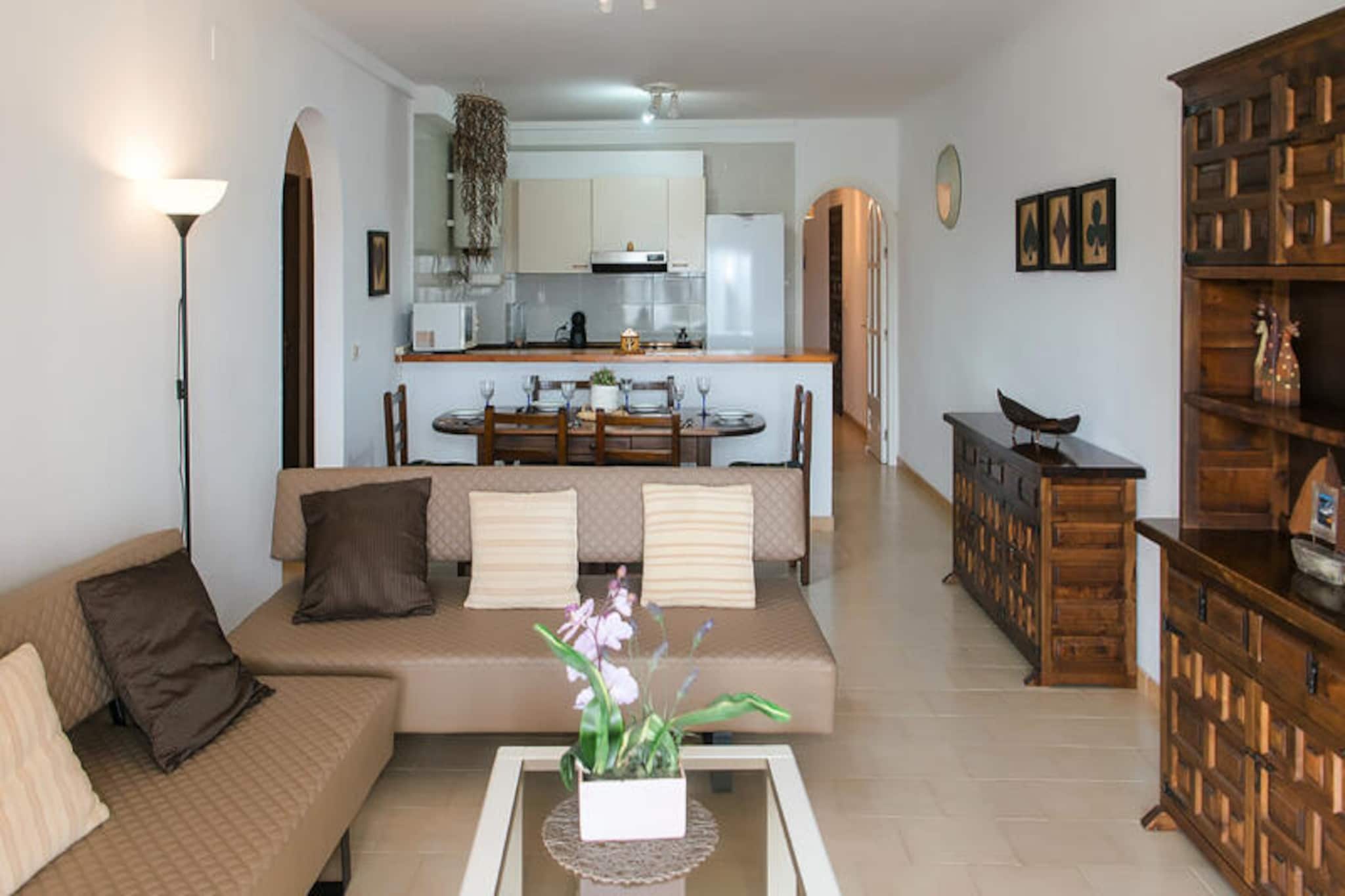 In the heart of Empuriabrava, a town affectionately known as the 'Venice of Spain,' these charming 65 m² apartments offer a serene escape for up to six guests. With their unique location along the picturesque canals, they provide a perfect blend of comfort and stunning views, making them an ideal retreat for families, couples, or friends seeking a memorable getaway. The spacious terrace overlooking the shimmering pool and tranquil waterways invites you to relax and soak in the beauty of this coastal gem.
The interior of the apartment is thoughtfully designed to maximize comfort and functionality. A bright and airy living room, bathed in natural light from large panoramic windows, seamlessly connects to a fully equipped kitchen. Here, you’ll find everything you need to prepare delicious meals, which can be enjoyed in the cozy dining area. The living room also features two individual sofas that easily convert into beds, offering additional sleeping arrangements. Two inviting bedrooms, each with a comfortable double bed, ensure restful nights, while the modern bathroom with a shower adds to the convenience. Private parking is included, so you can explore the area worry-free.
Empuriabrava’s charm lies in its extensive network of canals, perfect for leisurely strolls or boat rides. The town is also a haven for food lovers, with its array of restaurants serving fresh local cuisine. For adventure seekers, the nearby beaches and natural parks offer endless opportunities for outdoor activities. Whether you’re savoring the Mediterranean breeze on your terrace or exploring the vibrant surroundings, these apartments promise an unforgettable stay in one of Spain’s most enchanting destinations.