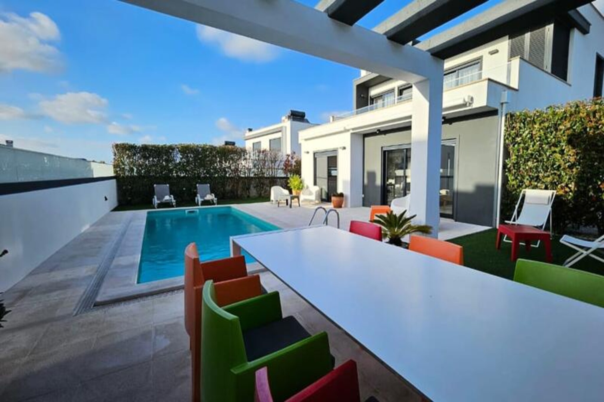 In the heart of Portugal’s stunning Silver Coast, this modern villa offers the perfect blend of comfort, style, and convenience for your next getaway. Just minutes from the medieval charm of Óbidos and some of the region’s most beautiful beaches, this property invites you to experience the best of coastal living. Imagine waking up to the gentle Portuguese sun, enjoying breakfast on the terrace, and planning a day filled with exploration, relaxation, or both. Whether you’re drawn to the historic streets of Caldas da Rainha or the world-famous waves of Nazaré, this villa is your ideal starting point. 
 
 Inside, the villa boasts three spacious bedrooms, including two with queen-size beds and one with twin beds that can be converted into a king-size. The two modern bathrooms and fully equipped kitchen make it easy to settle in and feel at home. The bright living room, complete with a gas fireplace, opens directly onto the terrace and pool area, creating a seamless indoor-outdoor flow. Every detail has been designed with your comfort in mind, ensuring a relaxing and enjoyable stay.
 
 Step outside to discover your private oasis. The heated pool (available from May to October upon request) is perfect for a refreshing dip, while the barbecue and relaxation area set the stage for memorable evenings with family or friends. The sunny terrace invites you to soak up Portugal’s mild climate, whether you’re sipping a glass of local wine or simply unwinding with a good book.
 
 With its unbeatable location, this villa is a gateway to the Silver Coast’s treasures. Explore the markets of Caldas da Rainha, the medieval streets of Óbidos, or the golden sands of Foz do Arelho. For adventure seekers, the waves of Nazaré and the scenic trails of the region await. Book your stay now and create unforgettable memories in this exceptional Portuguese retreat.