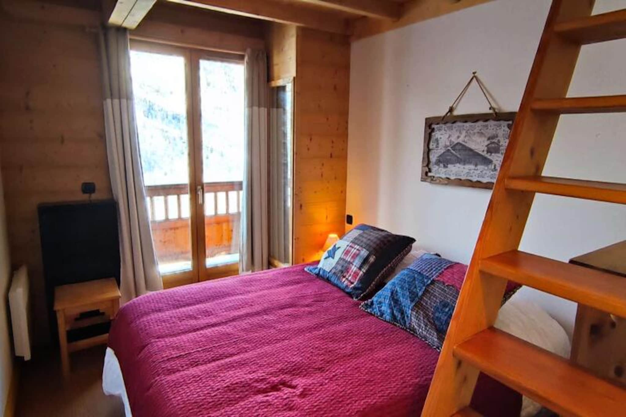 Perched at an altitude of 2,100 meters in the serene 'Hameau' area of Isola 2000, this charming semi-detached chalet offers a perfect blend of alpine comfort and breathtaking views of the resort. Surrounded by the pristine beauty of the Mercantour National Park, this chalet invites you to experience the unique charm of the Southern Alps, where sunshine meets snowy peaks and outdoor adventures await year-round. \n\nThe chalet spans 60 square meters and features two cozy bedrooms with double beds, a mezzanine with an additional double bed, and a sleeping area with bunk beds designed for children. Cotton sheets and towels are provided for weekly winter rentals, ensuring a comfortable stay. The living area is warm and inviting, with a fireplace adding a touch of rustic charm, while the fully equipped kitchen allows for delightful home-cooked meals. A TV is included for your entertainment, and the chalet is strictly non-smoking and pet-free, ensuring a clean and tranquil environment. \n\nConveniently located within the pedestrianized 'Les Chalets du Mercantour' development, the chalet offers direct access to the resort center via a funicular, shuttle, or ski path. A condominium elevator just 20 meters away connects you to an intermediate ski slope leading to the first ski lifts, making it an ideal base for ski enthusiasts. In summer, explore the stunning trails of the Mercantour National Park or enjoy the vibrant atmosphere of the Alpes d'Azur. \n\nWhether you’re seeking a winter escape on the slopes or a summer retreat in the sun-drenched Alps, this chalet is your gateway to unforgettable memories in one of France’s most picturesque mountain destinations.