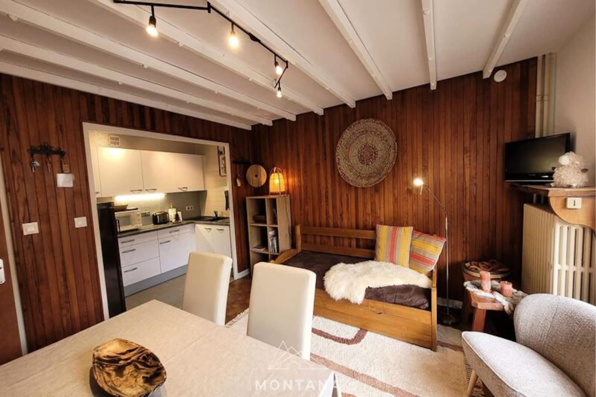 In the picturesque heart of Le Grand-Bornand, this charming 2-room apartment offers a cozy retreat for up to four guests. Surrounded by the majestic Aravis mountain range, it’s the perfect base for an alpine escape, whether you’re seeking snowy adventures in winter or tranquil summer getaways. The village’s warm ambiance and stunning natural beauty create an inviting atmosphere for all who visit. \n\nThe apartment is thoughtfully designed for comfort and convenience. The living room features a sofa bed that converts into two single beds, while the bedroom boasts a plush double bed for restful nights. A fully equipped kitchen allows you to prepare delicious meals to enjoy on the balcony, where breathtaking views of the surrounding peaks await. The bathroom includes a modern shower, and a separate toilet adds extra practicality. Located on the first floor of the Pointe Percée residence, this apartment combines privacy with easy access to the village’s vibrant center.\n\nJust 300 meters from the gondolas and leisure center, the location is ideal for exploring the region. In winter, enjoy seamless access to the ski slopes, while summer brings opportunities for hiking, cycling, and discovering the area’s lush alpine meadows. Nearby shops, restaurants, and the ski bus ensure everything you need is within reach, making your stay as effortless as it is enjoyable.\n\nWhether you’re here to carve through fresh powder, hike scenic trails, or simply relax and soak in the mountain vistas, this apartment offers a welcoming haven in the heart of Le Grand-Bornand. Create unforgettable memories in this idyllic alpine village, where every season brings its own unique charm.