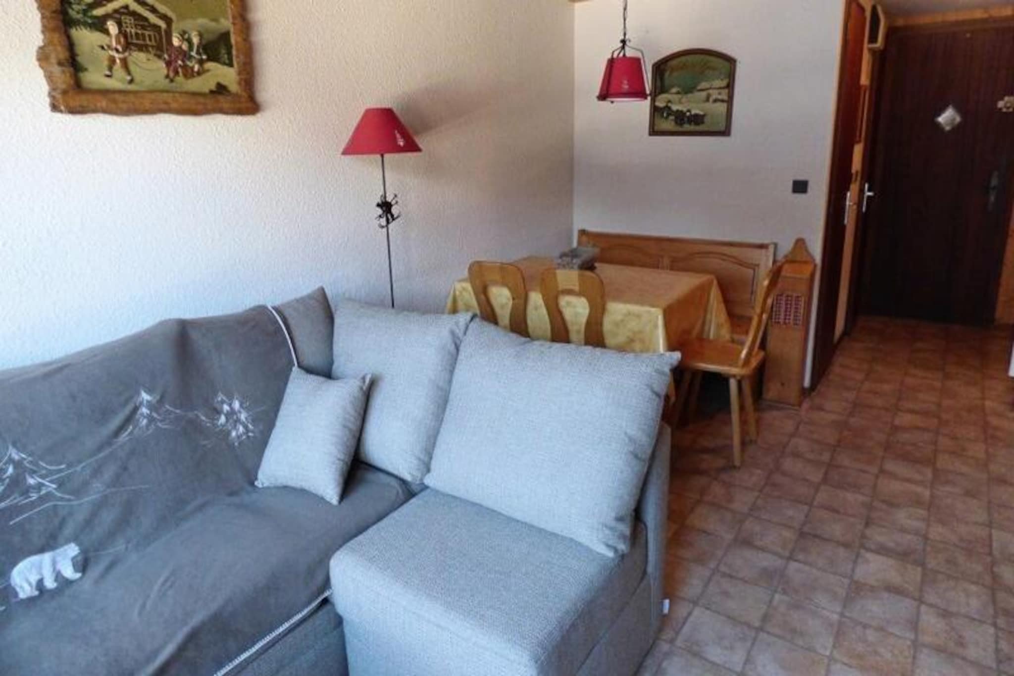 High above the picturesque village, this cozy apartment in the LES PARASSES residence offers a serene retreat with breathtaking views of the Aravis mountain range. Imagine waking up to the golden hues of the sun illuminating the peaks and enjoying your morning coffee on the south-facing balcony while the tranquil charm of the alpine surroundings sets the tone for your day. Perfect for families or friends seeking a peaceful yet accessible mountain escape. 
                    Inside, the apartment is thoughtfully designed to accommodate up to six guests across two rooms and a mezzanine. The living room features a comfortable sofa bed, while the bedroom offers a double bed and the mezzanine provides two single beds. A newly equipped kitchenette invites you to prepare hearty meals after a day of exploring, and the separate shower room and WC ensure convenience for all. The property also includes a garage, adding practicality to its charm. Please note that bed linen and towels are not provided, and a tourist tax applies to adults. 
                    Located just 350 meters from the village center and 800 meters from the gondola lifts, the apartment is ideally situated for both relaxation and adventure. The nearby shuttle bus stop, only 50 meters away, ensures easy access to the slopes and other local attractions. Whether you’re skiing in winter or hiking in summer, the region offers endless opportunities to connect with nature and enjoy the alpine lifestyle. 
                    With its stunning views, comfortable amenities, and prime location, this apartment is your gateway to unforgettable mountain memories. Let the beauty of the Aravis range and the charm of the village create a holiday experience you’ll cherish forever.
