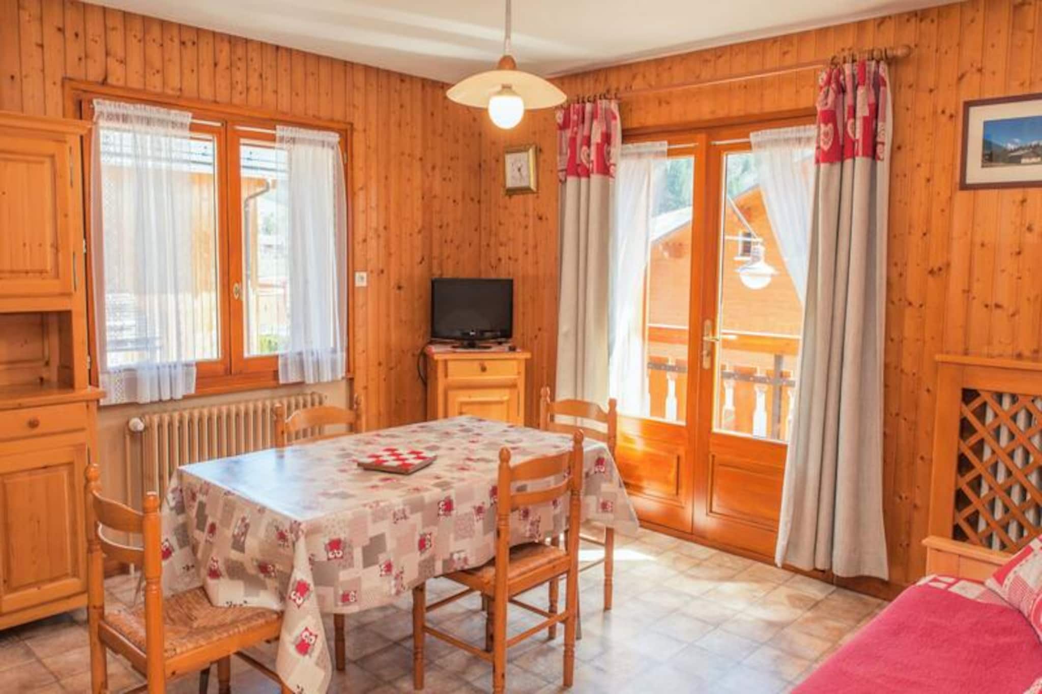 Where the majestic Aravis mountain range meets the charm of a traditional alpine village, this delightful apartment offers a serene retreat for up to six guests. Located on the first floor of the Tilleuls residence, it combines convenience with breathtaking views from its south/east-facing balcony, where you can soak in the beauty of the surrounding peaks and valleys. Whether you’re here for winter sports or summer hikes, this property invites you to experience the best of Grand-Bornand Village.  
                      Inside, the 49m² apartment is thoughtfully designed to ensure comfort and practicality. The living space is bright and welcoming, perfect for relaxing after a day of adventure. The kitchen is fully equipped for preparing hearty meals, while the cozy sleeping arrangements cater to families or small groups. Guests will appreciate the ease of access to nearby amenities, with the gondola lifts, ice rink, and ski trails just a short stroll away. Please note that bed linen and towels are not provided, and end-of-stay cleaning is the responsibility of the guest.  
                      The location is ideal for exploring the area, with the village center only 200 meters away and the downhill ski slopes just 400 meters from your doorstep. Cross-country ski trails are equally close, and a free shuttle stop is conveniently situated 20 meters from the residence. In summer, the region transforms into a haven for hikers and cyclists, offering trails that wind through lush meadows and forests. With one private parking space included, you’ll have everything you need for a seamless stay.  
                      Whether you’re seeking thrilling alpine adventures or peaceful moments surrounded by nature, this apartment offers the perfect base to create unforgettable memories in the heart of the French Alps.