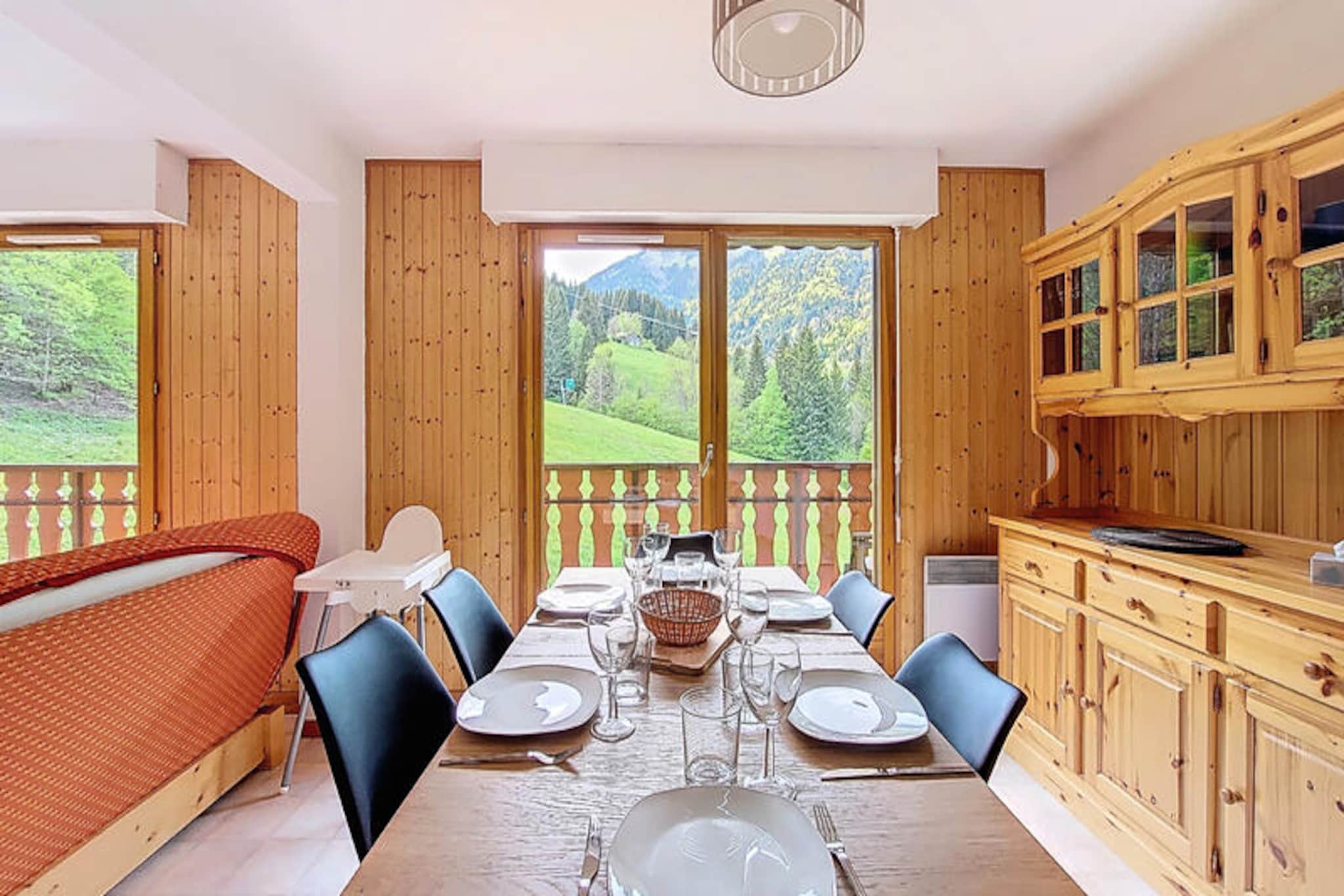 In the charming Saint Jean D'Aulps resort, just a short drive from Morzine and Montriond, this cozy apartment offers a delightful alpine retreat for up to seven guests. Imagine waking up to the serene view of the ski slopes from your private balcony, sipping coffee as the gondola lift hums to life nearby, ready to whisk you into a day of adventure. This property is perfect for families or groups seeking both comfort and proximity to the vibrant activities of the French Alps.  
                      Inside, the apartment is thoughtfully designed to ensure a relaxing stay. The entrance leads to a convenient separate WC and bathroom. The spacious living room features a dining area, two comfortable sofas, and a television, creating a welcoming space for evenings together. The fully equipped kitchen includes modern appliances such as a dishwasher, coffee maker, and raclette grill, making it easy to prepare hearty meals after a day on the slopes. The three bedrooms offer flexible sleeping arrangements, including a double bed, twin beds, and a bunk bed with a double sofa bed, all complemented by ample storage.  
                      Beyond the apartment, guests benefit from a designated parking space and a private cellar for storing ski gear. The resort's amenities and nearby attractions, including Morzine's lively après-ski scene and Montriond's picturesque lake, provide endless opportunities for exploration. Whether you're skiing in winter or hiking in summer, this apartment is your gateway to unforgettable alpine experiences.  
                      With its prime location, cozy atmosphere, and practical amenities, this property invites you to create lasting memories in the heart of the French Alps.