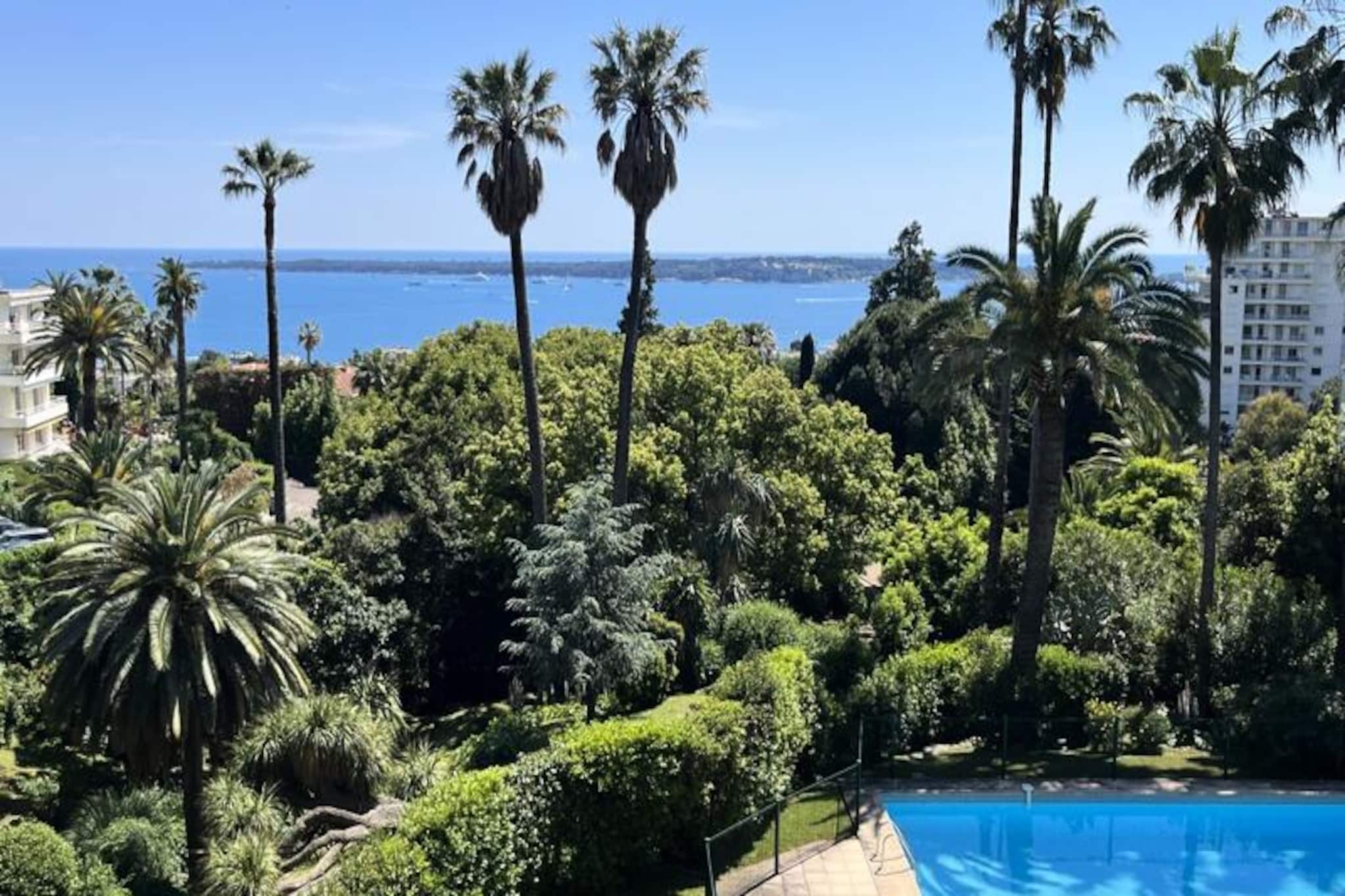 Awaken your senses in the heart of Cannes, where this elegant 78m² apartment in the prestigious Basse Californie district offers a serene retreat with breathtaking south-facing views of the Lérins Islands. Perfectly positioned near the beaches and city center, this property invites you to experience the glamour and charm of the French Riviera. Whether you're strolling along the Croisette or savoring the Mediterranean breeze from your private balcony, every moment here feels like a celebration of refined living.
Inside, the apartment is a harmonious blend of comfort and sophistication. The spacious living room, bathed in natural light, features a cozy relaxation area and a dining space ideal for intimate gatherings. Two beautifully appointed bedrooms cater to all needs: the master bedroom with a versatile 180x190cm bed, and a second bedroom with two single beds. A fully equipped kitchen awaits culinary enthusiasts, while two bathrooms—one with a bathtub and the other with a shower—ensure convenience for all guests. Modern amenities such as air conditioning, Wi-Fi, a TV, and even games and books for all ages add to the comfort. The shared swimming pool and private parking make this property a true haven for relaxation.
Just minutes away, Cannes unveils its treasures. From the iconic film festival venue to the sun-kissed beaches, the city is a playground for culture, gastronomy, and leisure. Take a ferry to Île Sainte-Marguerite for a unique dining experience at La Guérite, or unwind at Mademoiselle Gray Plage Barrière. With easy access to public transport, including the Palmbus line and Cannes train station, exploring the Riviera is effortless.
This apartment is more than a place to stay—it’s an invitation to immerse yourself in the elegance and allure of Cannes. Let the French Riviera enchant you, creating memories that will linger long after your departure.