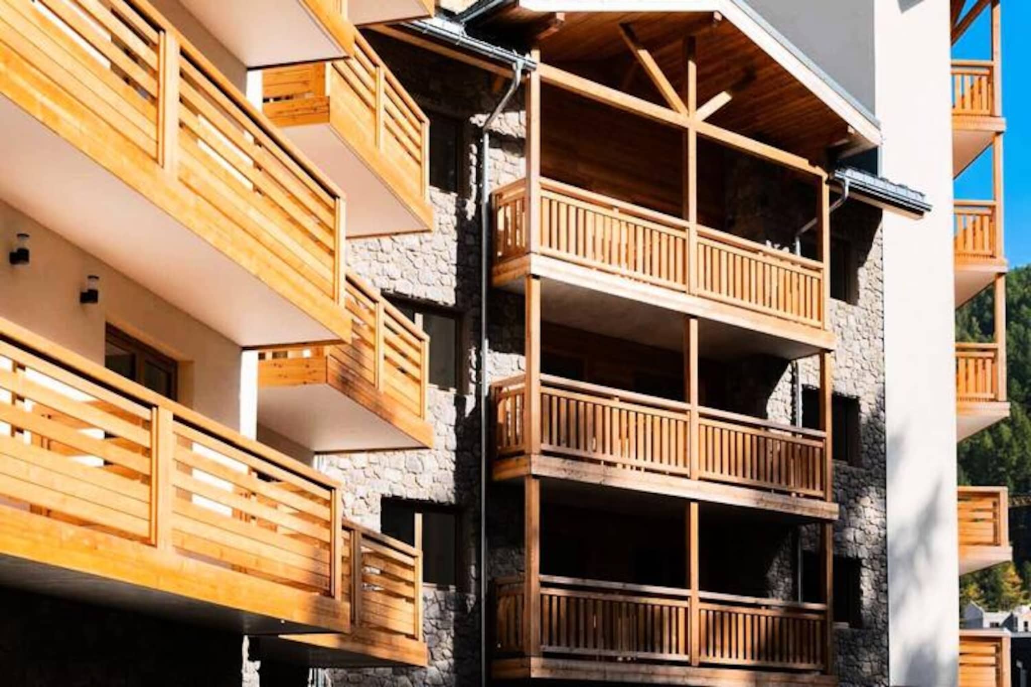 High in the majestic French Alps, where the crisp mountain air invigorates the senses, the Arya Living Stone Residence in Vars offers a modern alpine escape just 80 meters from the slopes. With its prime location at 1,800 meters above sea level, this upscale residence combines contemporary comfort with the thrill of doorstep access to the renowned Forêt Blanche ski area, boasting 185 km of pistes that climb to an altitude of 2,750 meters. Whether you're here for the adrenaline of skiing or the tranquility of snow-covered peaks, this destination promises unforgettable moments. 

The thoughtfully designed apartments, ranging from 37 to 39 m², provide a cozy yet stylish retreat. Each unit features a living room with a double sofa bed, a well-equipped kitchenette, a bedroom with a double bed or twin beds, and a sleeping alcove with bunk beds. A private balcony invites you to soak in the breathtaking alpine views, while modern amenities such as WiFi and a flat-screen television ensure your stay is as convenient as it is relaxing. Additional comforts like included bed linen and towels, as well as optional extras like baby cots and end-of-stay cleaning, cater to your every need. 

Beyond the residence, Vars offers a vibrant array of activities. From tobogganing and dog sledding to snowmobiling, the resort is a winter wonderland for all ages. For those who prefer a slower pace, 50 km of scenic walking trails reveal the serene beauty of the mountains. After a day of adventure, the resort’s restaurants and shops provide everything you need to unwind, from hearty alpine meals to local delicacies. 

Whether you're seeking thrilling outdoor pursuits or a peaceful mountain retreat, the Arya Living Stone Residence is your gateway to the enchanting charm of Vars. Experience the perfect blend of modern luxury and alpine tradition in this unforgettable destination.