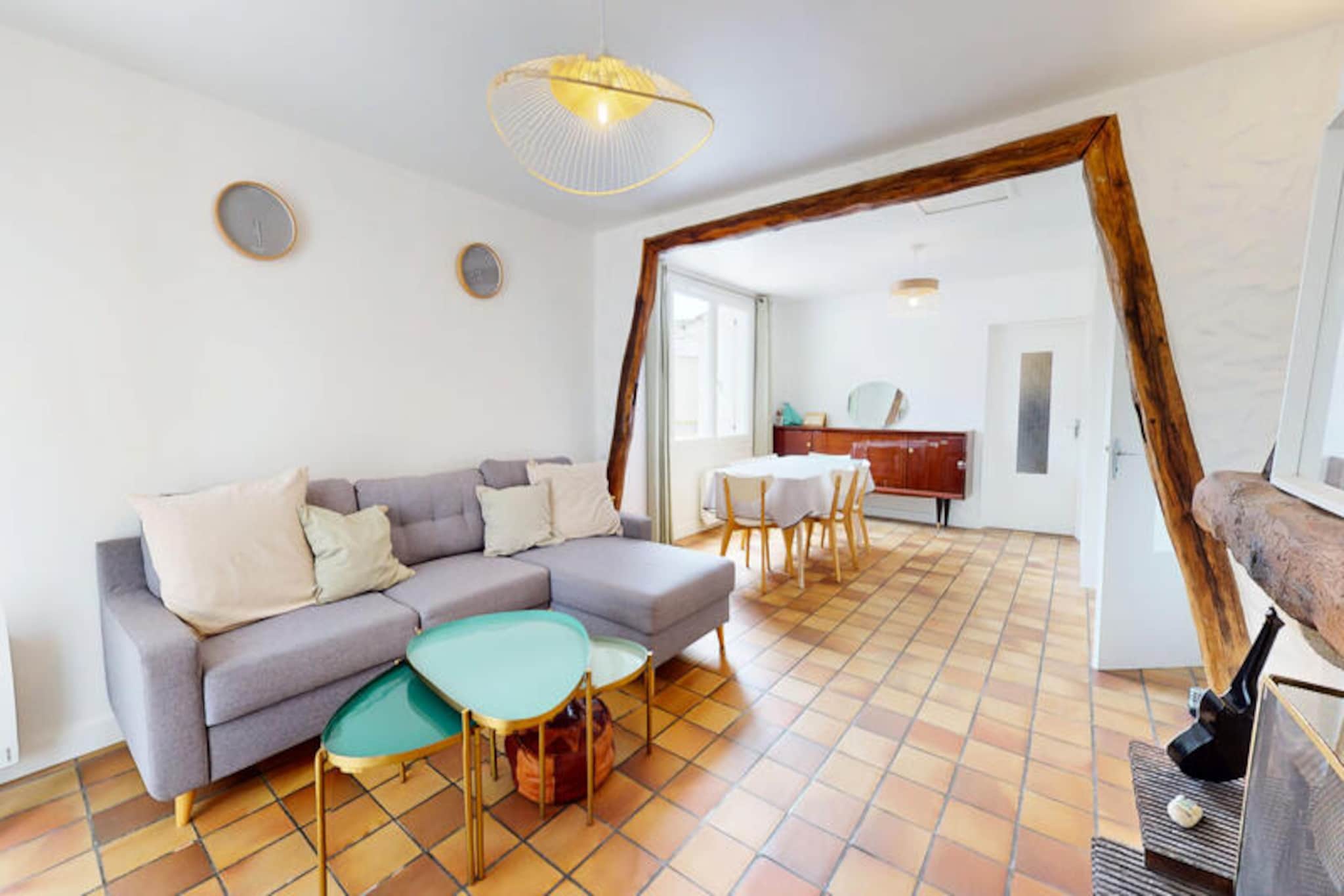 In the tranquil coastal town of Brétignolles-sur-Mer, just 800 meters from golden sandy beaches, Pomme de Pins invites you to unwind and reconnect with nature. This charming holiday home is a haven of comfort and simplicity, perfect for families, couples, or friends seeking a serene escape along the Vendée coast. Imagine waking up to the sound of sea breezes, enjoying breakfast in the enclosed garden, and setting off for a day of seaside adventures. \n\nInside, the home is thoughtfully designed to accommodate up to four guests. The cozy living room is an inviting space to relax after a day exploring the coast, while the dining room, with its large table, sets the scene for shared meals and laughter. The fully equipped kitchen ensures you can prepare your favorite dishes with ease, featuring an oven, stovetop, refrigerator, microwave, and coffee maker. The sleeping arrangements include a master bedroom with a comfortable double bed and a second bedroom with two single beds, ideal for children or additional guests. The bathroom features a bathtub, perfect for unwinding, and a separate toilet adds convenience.\n\nStep outside to discover the private, fully enclosed garden—a true highlight of this property. Whether you’re dining al fresco, letting the children play freely, or simply soaking up the sun, this outdoor space offers peace and privacy. The home’s location in a quiet neighborhood ensures a restful stay, while its proximity to the beach, local shops, and cycling paths makes it easy to explore the area. Surf enthusiasts will love the nearby La Sauzaie surf spot, while nature lovers can enjoy scenic walks around Lake Jaunay or picnics in the great outdoors.\n\nFor family-friendly fun, the Parc des Dunes is a short drive away, and the charming port town of Saint-Gilles-Croix-de-Vie offers delightful markets and coastal charm. A 25-minute drive brings you to Les Sables-d’Olonne, known for its expansive beach and vibrant attractions, while the world-renowned Puy du Fou theme park is just an hour away. With its blend of comfort, convenience, and coastal charm, Pomme de Pins is the perfect base for an unforgettable holiday.