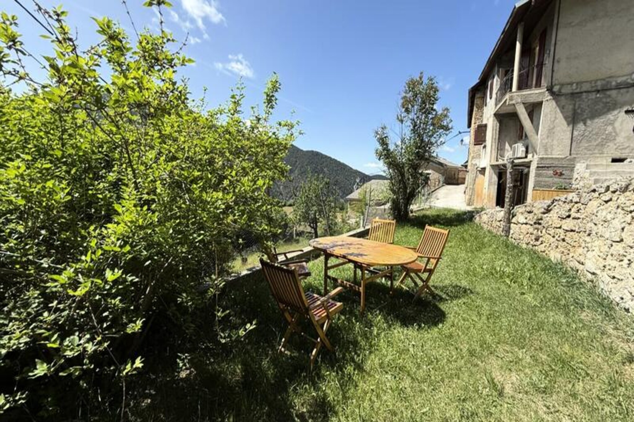 Surrounded by the serene beauty of the French Alps, this charming apartment offers a tranquil retreat just 4 km from the family-friendly Valberg resort. Here, amidst the unspoiled nature of the hamlet of Saint Bres in Guillaumes, you’ll find a perfect balance of peace and convenience. Whether you’re seeking a mountain escape or a cozy base for exploring the region, this property invites you to unwind and reconnect with nature. The breathtaking views of the surrounding peaks and the gentle rustle of alpine breezes set the tone for a truly relaxing getaway. 
 
 The apartment has been thoughtfully renovated to provide modern comfort while retaining its warm, inviting character. With one bedroom featuring a comfortable double bed and a living room equipped with a sofa bed, it comfortably accommodates up to four guests. The fully integrated kitchen is ideal for preparing meals to enjoy in the cozy dining area or outside in the private garden. The bathroom boasts a sleek walk-in shower, and high-speed Wi-Fi ensures you stay connected throughout your stay. Bed linen and towels are provided for your convenience, making this a hassle-free choice for your holiday. 
 
 Step outside to your private garden, where you can savor sunny afternoons with a meal al fresco or simply relax while soaking in the panoramic mountain views. The peaceful surroundings and natural beauty create an idyllic setting for unwinding after a day of adventure. The Valberg resort, just a short 6-minute drive away, offers a variety of activities year-round, from skiing and snowboarding in winter to hiking and mountain biking in summer. 
 
 Whether you’re drawn by the allure of the mountains or the charm of a quiet alpine hamlet, this apartment is your gateway to an unforgettable holiday. With its blend of modern amenities and stunning natural surroundings, it’s the perfect choice for couples, small families, or friends seeking a peaceful retreat in the heart of the Alps.