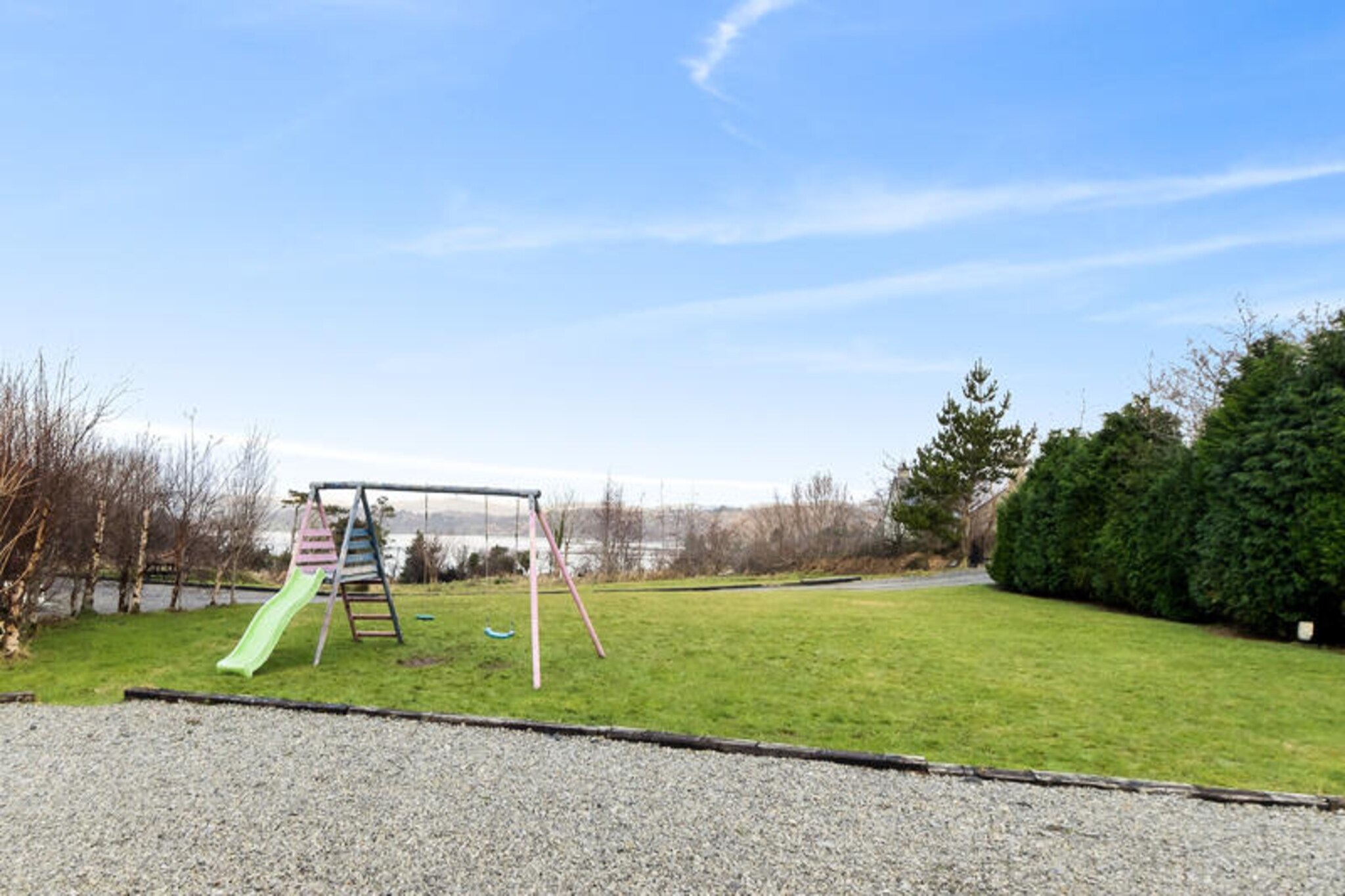 Surrounded by the rugged beauty of Connemara, this charming house in Letterfrack offers a serene retreat for families or groups seeking to explore Ireland’s wild west. Wake up to breathtaking mountain views and the tranquil sounds of nature, with Connemara National Park just 2 km away. Whether you’re drawn to the dramatic landscapes or the welcoming local culture, this property is perfectly situated for an unforgettable getaway.  
                      Inside, the house boasts four spacious bedrooms, comfortably accommodating up to seven guests. The open-plan kitchen is fully equipped with modern appliances, including a gas hob, refrigerator, dishwasher, and coffee maker, making it easy to prepare meals after a day of adventure. Cozy up by the fireplace in the inviting living area or enjoy the convenience of Wi-Fi, satellite TV, and a DVD player for entertainment. With central heating and air conditioning, the home ensures comfort in every season. Outdoors, the garden furniture, barbecue, and children’s play area provide opportunities for relaxation and fun.  
                      The property’s location is ideal for exploring nearby attractions. Take a short drive to the sandy shores of Renvyle Beach or Glassillaun Beach, or visit the picturesque town of Clifden, just 12 km away, for dining and shopping. Nature enthusiasts will love the proximity to Ballynakill Lough and the Traheen River, while families can enjoy local cafes, playgrounds, and scenic trails. For golfers, Connemara Golf Links is only 27 km away, offering stunning views alongside world-class greens.  
                      Whether you’re seeking adventure in the great outdoors or a peaceful escape, this Letterfrack home provides the perfect base to experience the magic of Connemara.