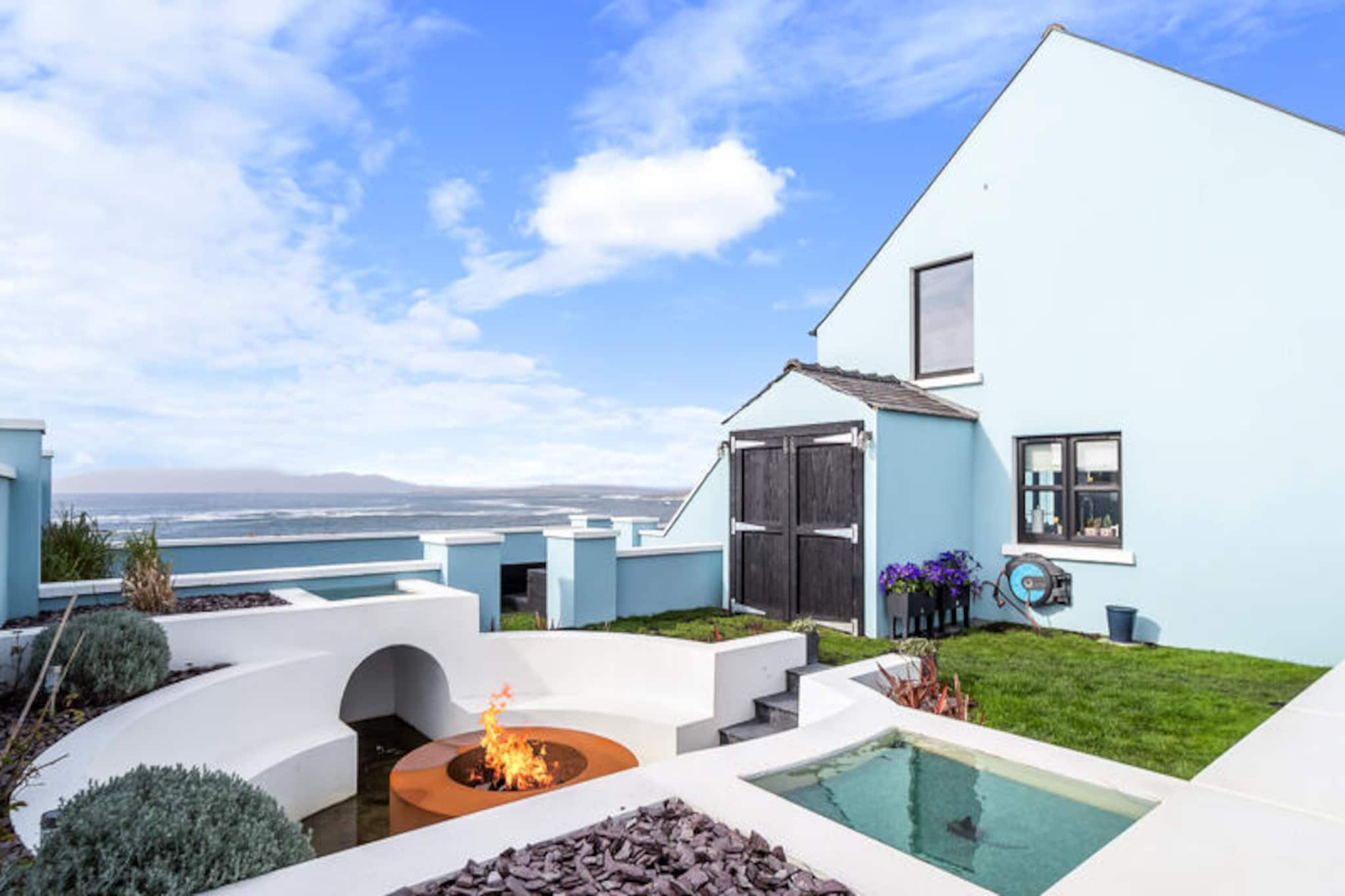 Amidst the rugged beauty of Ireland's west coast, this charming rural cottage in Carna offers a tranquil retreat for those seeking a true escape. Surrounded by rolling hills, wildflowers, and the soothing sound of the Atlantic breeze, this home invites you to slow down and savor the unspoiled landscapes of Connemara. Whether you're looking for a peaceful getaway or a base to explore the region's natural wonders, this cottage is a perfect choice. \n\nInside, the property spans 100 m² and comfortably accommodates up to six guests across three cozy bedrooms. The thoughtfully designed interiors blend rustic charm with modern comforts, ensuring a warm and inviting atmosphere. The separate kitchen is fully equipped with a refrigerator, microwave, oven, freezer, dishwasher, and all the essentials for preparing hearty meals. Additional amenities include a washing machine, dryer, Wi-Fi, central heating, and a television, making it a convenient and comfortable home away from home. The garden, complete with outdoor furniture and a barbecue, is ideal for enjoying sunny afternoons or starlit evenings. \n\nCarna is a gateway to the breathtaking landscapes of Connemara, with its pristine beaches, rugged mountains, and crystal-clear lakes. Explore the nearby coral beaches, hike the scenic trails, or take a short drive to the renowned Connemara National Park. The area is steeped in Irish culture, with traditional music sessions and warm hospitality in local pubs. For those who love the outdoors, activities like fishing, cycling, and birdwatching are all within easy reach. \n\nWhether you're drawn by the allure of Ireland's wild beauty or simply wish to unwind in a serene setting, this cottage offers an unforgettable experience. Let the charm of Carna and the magic of Connemara create memories that will last a lifetime.