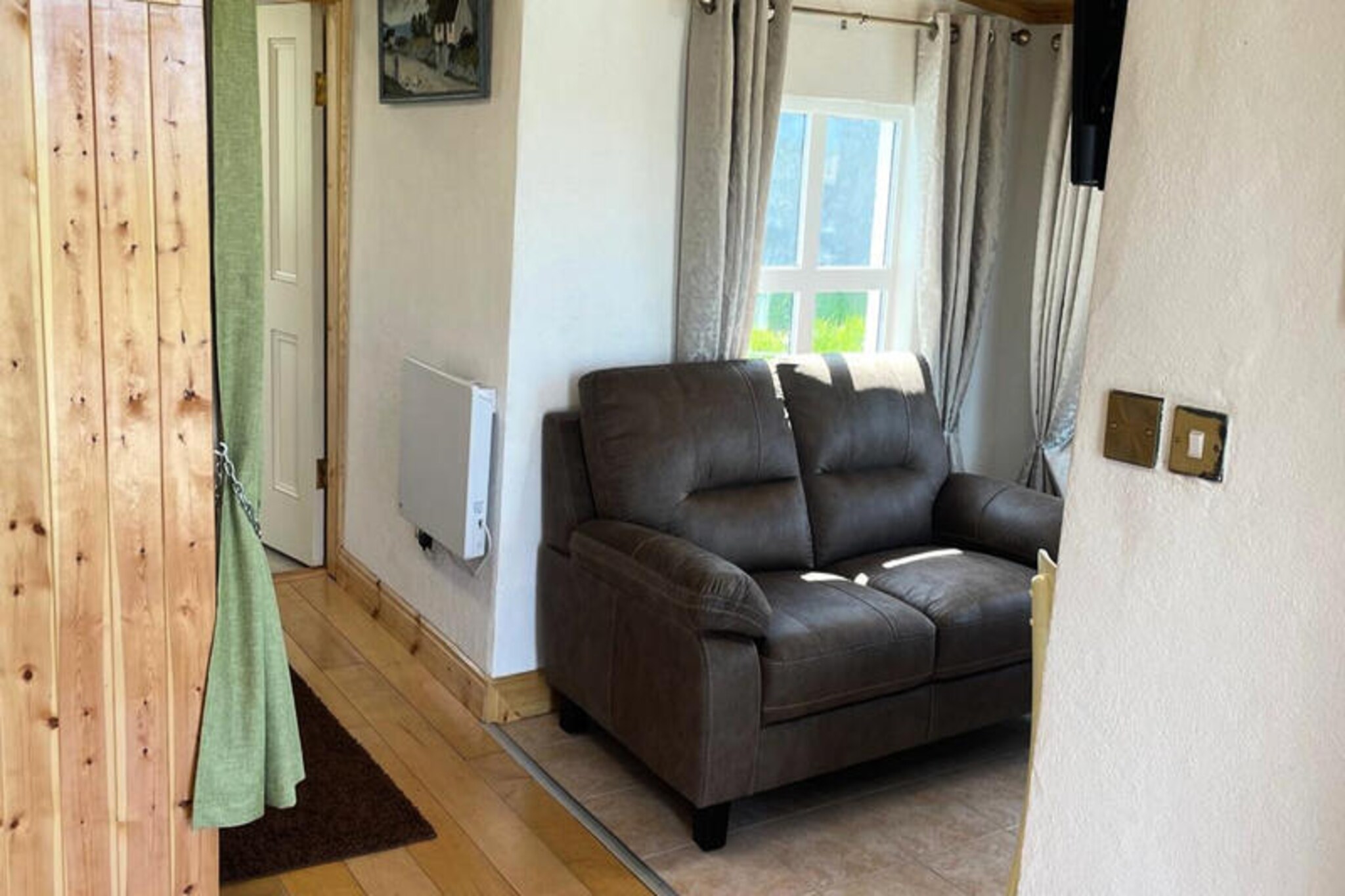 On the rugged coastline of Roundstone, where the Atlantic breeze carries the scent of wildflowers, this charming chalet offers a tranquil escape for two. Surrounded by lush greenery and the soothing sounds of nature, it’s the perfect retreat for couples seeking serenity and a connection to Ireland’s untamed beauty. Whether you’re sipping tea in the garden or watching the sun dip below the horizon, every moment here feels like a breath of fresh air.  
                      Inside, the chalet is cozy and thoughtfully designed, with a comfortable bedroom and a living space that invites relaxation. The kitchen is fully equipped with modern appliances, including a refrigerator, microwave, oven, and toaster, ensuring you can prepare meals with ease. The property also features a washing machine, electric heating, and a TV for added convenience. Step outside to enjoy the garden furniture and barbecue, perfect for al fresco dining under the stars. On-site parking makes exploring the surrounding area effortless.  
                      Roundstone is a gateway to some of Ireland’s most spectacular landscapes. From the nearby beaches to the majestic Twelve Bens mountain range, adventure awaits at every turn. Stroll through the picturesque village, known for its vibrant arts scene and welcoming pubs, or venture further to discover Connemara’s rugged beauty. Whether hiking, cycling, or simply soaking in the views, this chalet places you at the heart of it all.  
                      A stay here is more than just a getaway—it’s an invitation to immerse yourself in the charm and magic of Ireland’s west coast. Let the peace of Roundstone rejuvenate your spirit and create memories to treasure forever.