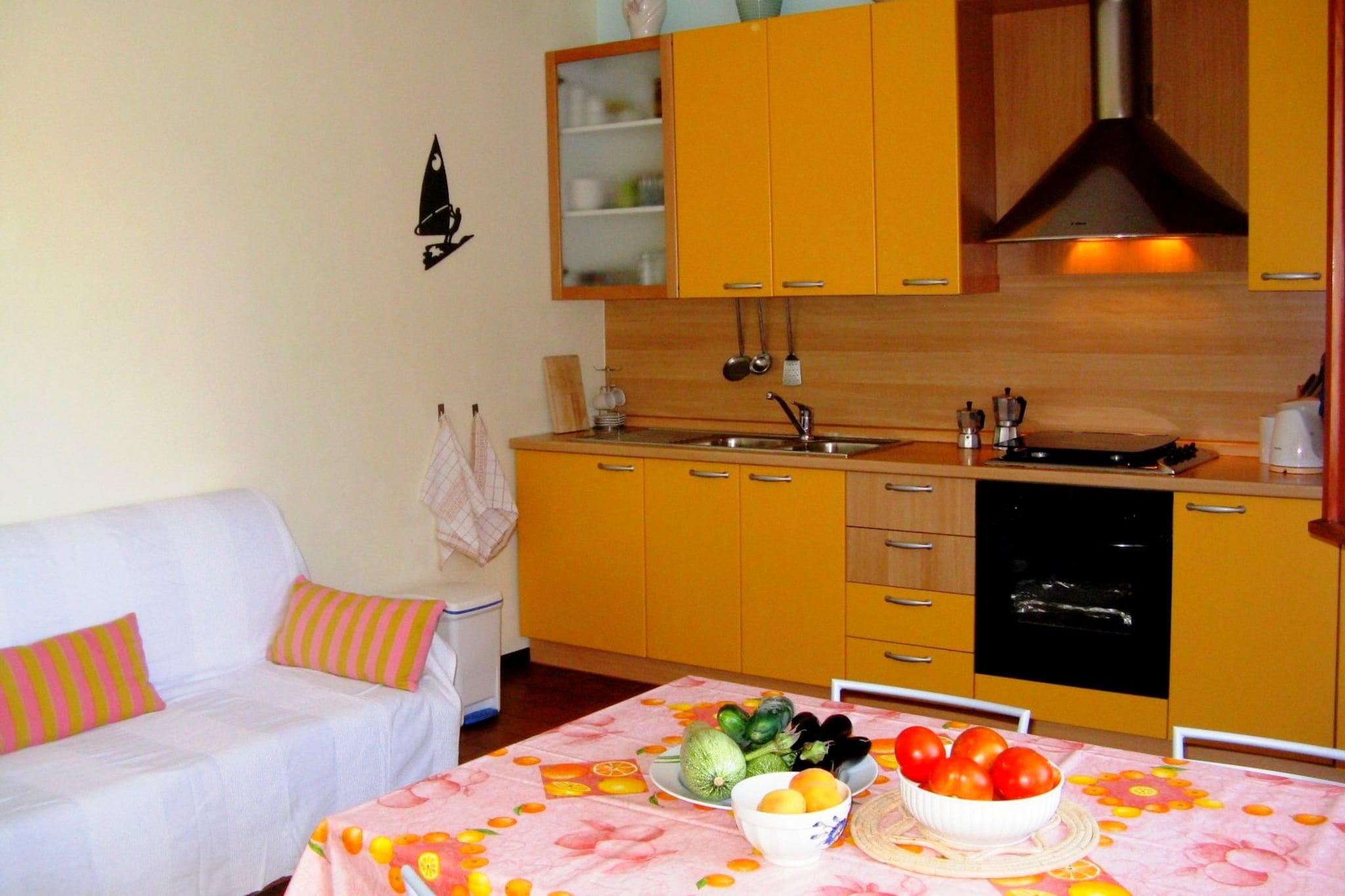 Ground floor: (Living room(double sofa bed, TV, stereo unit), open kitchen(electric kettle, cooker, hood, oven, fridge-freezer), bedroom(double bed), bathroom(shower, washbasin, toilet, bidet))\n\ncoffee machine, garden, garden, garden furniture, sun loungers, BBQ, parking, parasol, bicycles available, children\'s bed(on request)