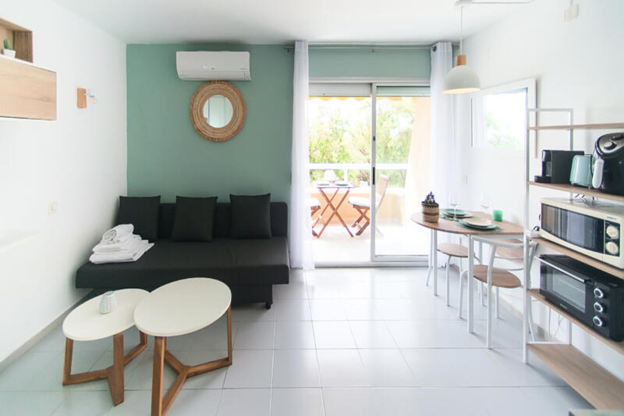 Where the Mediterranean breeze meets the golden sands, this charming 30 m² apartment in the heart of Estartit offers a serene escape for up to four guests. Surrounded by the vibrant colors of the Costa Brava, this cozy retreat invites you to immerse yourself in the beauty of the sea and the rhythm of coastal life. Wake up to the sound of waves and let the tranquil atmosphere of this seaside haven rejuvenate your spirit.
Step inside to find a bright and inviting living space, complete with a comfortable sofa bed and a modern television for your entertainment. The open-plan design seamlessly connects the living area to a fully equipped kitchenette, where you can prepare Mediterranean-inspired meals with ease. The bedroom, featuring a plush double bed, promises restful nights, while the bathroom, with its luxurious bathtub, offers a private sanctuary to unwind after a day of sun and sea.
The apartment’s terrace is its crowning jewel, offering partial sea views that make every moment magical. Whether you’re sipping your morning coffee as the sun rises or enjoying a romantic evening under the stars, this outdoor space is perfect for creating unforgettable memories. Guests also have access to a shared swimming pool, ideal for cooling off on warm days and mingling with fellow travelers.
With the beach just a short stroll away, you’ll have endless opportunities to swim in the azure waters and bask in the Mediterranean sun. This Estartit apartment is your gateway to a relaxed and rejuvenating coastal getaway, where every detail has been designed to make your stay unforgettable.
