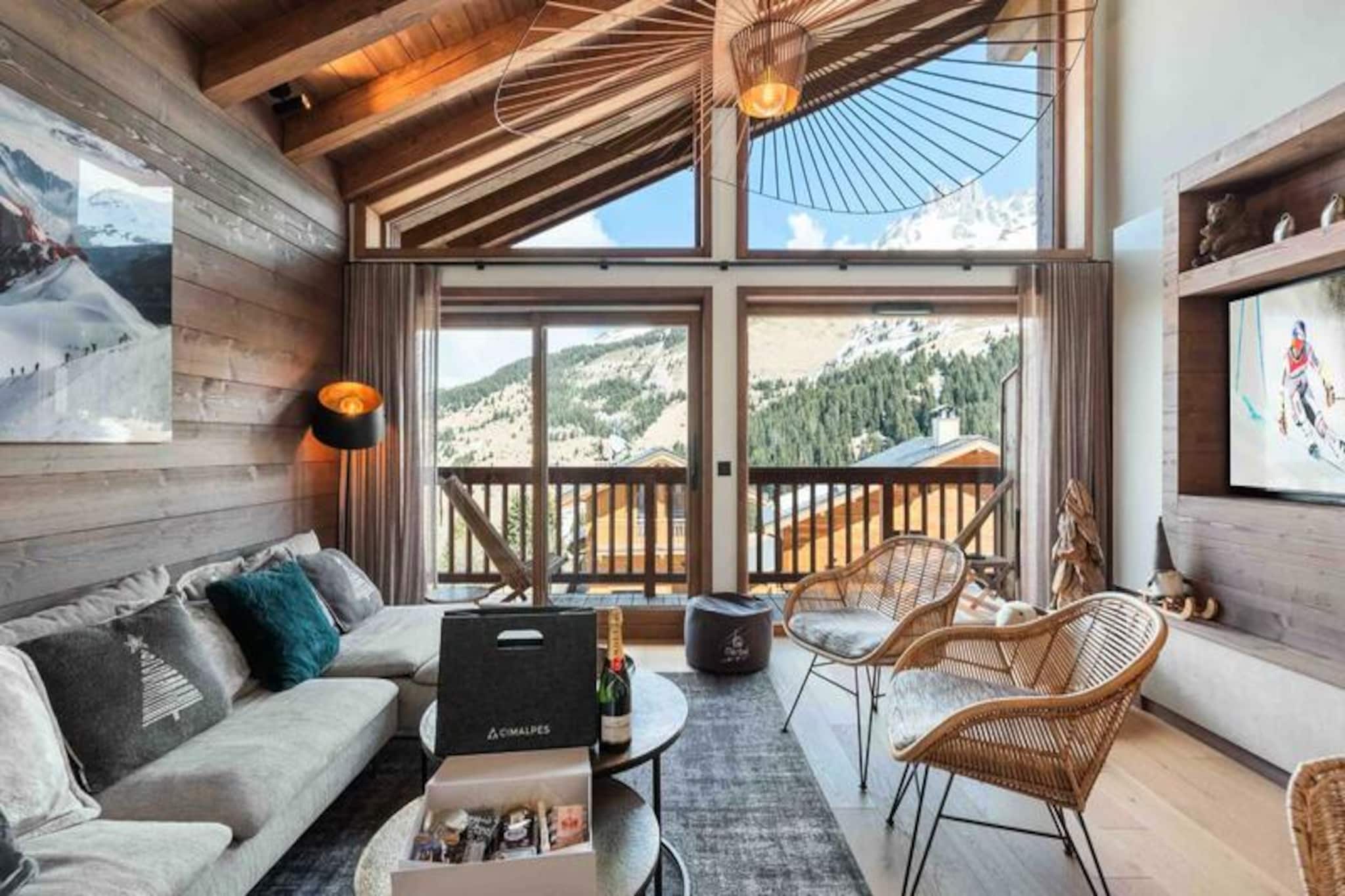 High above the picturesque Méribel Valley, this elegant 80m² apartment in Méribel-Mottaret offers a serene alpine retreat with unparalleled access to the slopes. Imagine waking up to panoramic views of snow-capped peaks from your south-facing balcony, breathing in the crisp mountain air, and stepping into a world of adventure just 200 meters away. Whether you're here for the thrill of skiing or the tranquility of nature, this residence perfectly combines modern comfort with the charm of the French Alps.
Inside, the apartment is thoughtfully designed to accommodate up to six guests. The open-plan kitchen is fully equipped with high-end appliances, including a Nespresso machine and a wine cellar, making it a joy to prepare meals after a day on the slopes. The living room, with its cozy sofa and television, opens onto the balcony, offering a perfect spot to unwind. The bedrooms are havens of relaxation, featuring plush double beds, en-suite facilities, and even balcony access for a private escape. A cabin room with bunk beds adds a playful touch, ideal for families with children. Additional amenities like a ski locker with a boot dryer, WiFi, and covered parking ensure a hassle-free stay.
Beyond the apartment, Méribel-Mottaret is a gateway to endless alpine activities. The \