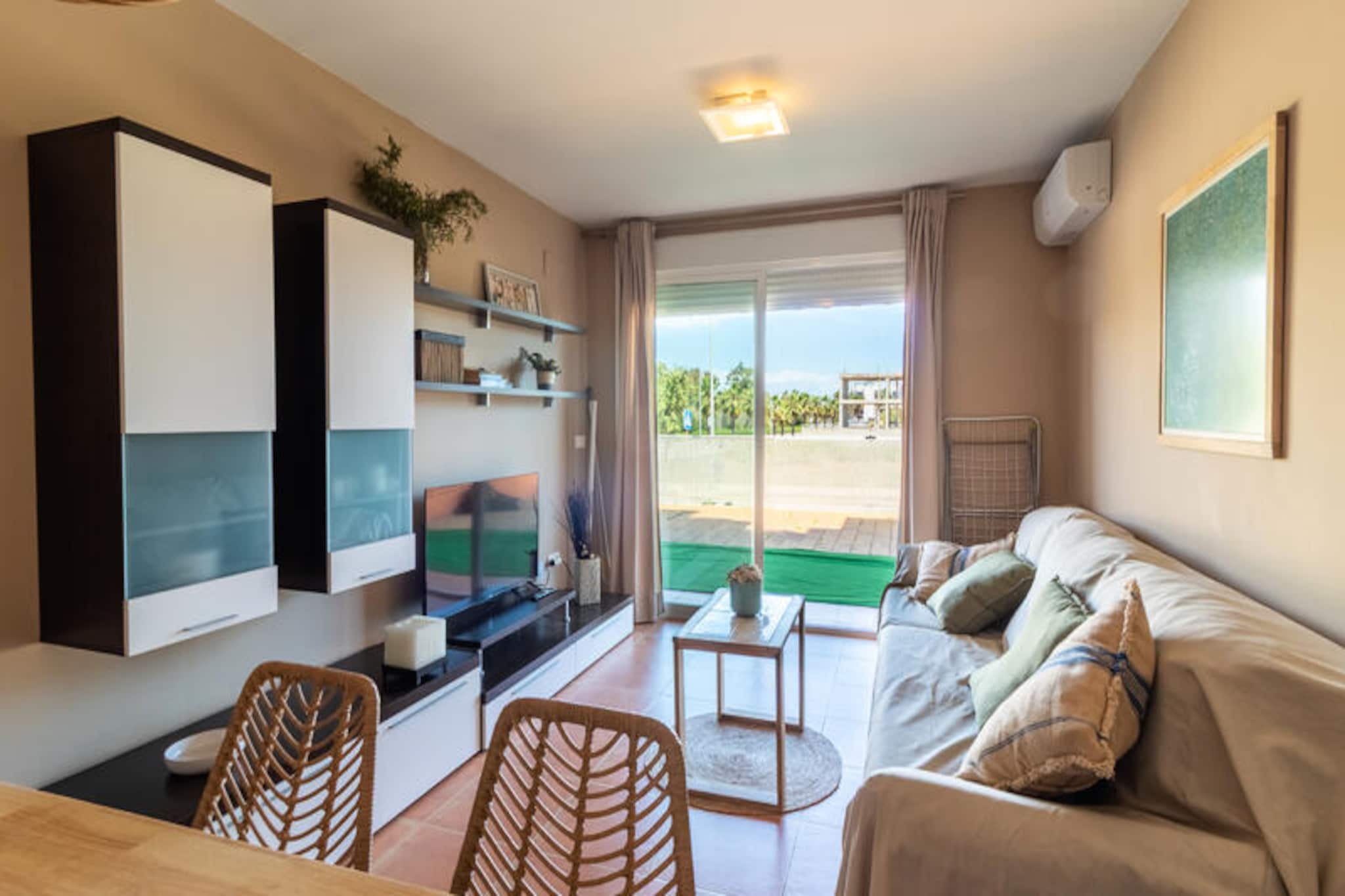 In the serene coastal town of Almenara, this delightful family apartment offers a perfect retreat for those seeking relaxation and Mediterranean charm. Surrounded by the tranquil atmosphere of Almarda Beach, this property invites you to unwind and create cherished memories with loved ones. The spacious 45-square-meter terrace and private garden provide a peaceful outdoor haven, ideal for morning coffees or evening gatherings under the stars. Whether you're traveling as a family, a couple, or a group of friends, this apartment is designed to make your stay unforgettable.
Inside, the bright and airy 59.85-square-meter space comfortably accommodates up to six guests. Two cozy bedrooms feature a double bed, a sofa bed, and two single beds, ensuring restful nights for everyone. The open-plan American-style kitchen is fully equipped with modern appliances, including a dishwasher, oven, microwave, and coffee maker, making meal preparation a breeze. The living room, complete with air conditioning, a television, and Wi-Fi, provides a comfortable space to relax after a day of exploring. For families with young children, the shared pool area, including a children’s pool, is a highlight, while the private parking, children’s playground, and padel court add to the convenience and enjoyment of your stay.
The apartment’s location offers easy access to nearby attractions and essential amenities. Just a short drive away, you’ll find the charming towns of Sagunto, Puerto de Sagunto, and Canet d’en Berenguer, each offering a unique blend of history, culture, and local cuisine. Supermarkets, such as Mercadona and Consum, are within 5 kilometers, ensuring you have everything you need at your fingertips. For those arriving by train or plane, Sagunto Renfe station is 11 kilometers away, and Manises Airport in Valencia is just a 43-kilometer drive.
Whether you’re soaking up the sun on Almarda Beach, exploring the rich history of Sagunto, or simply enjoying the comforts of this family-friendly apartment, your Mediterranean getaway promises to be a truly memorable experience.