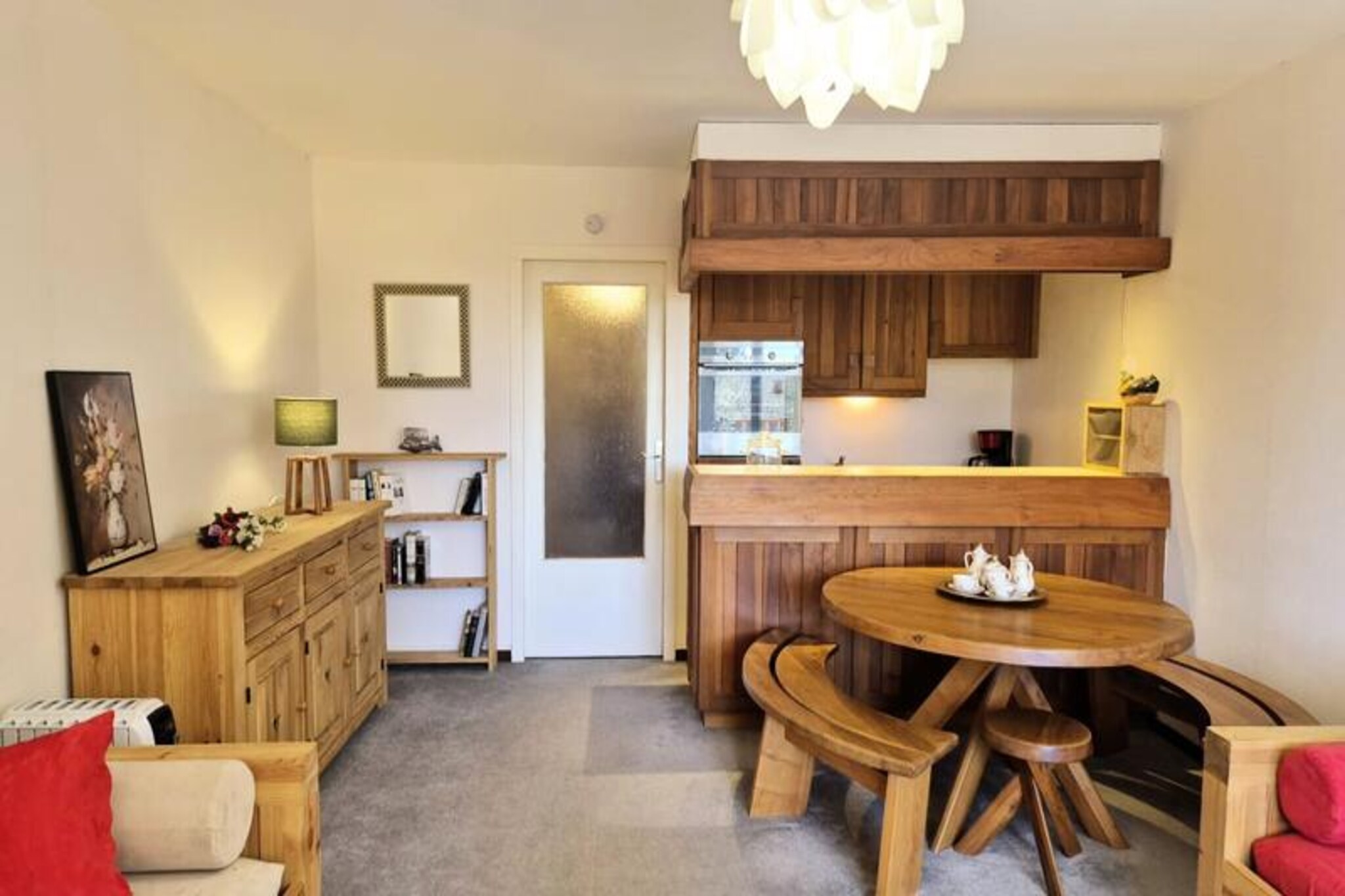 High above the serene landscapes of the Massif des Bauges Regional Natural Park, this charming apartment offers an idyllic mountain retreat at 1500 meters altitude. With its south-facing terrace overlooking a children's playground and direct ski-in/ski-out access, this property is perfect for families and outdoor enthusiasts seeking year-round alpine adventures. Whether you're here for the snowy slopes or the lush summer trails, every moment promises breathtaking views and unforgettable experiences. 
 
 Inside, the apartment is thoughtfully designed for comfort and practicality. The living room features a pull-out sofa bed with a quality mattress, while a cozy sleeping area includes a bunk bed for two. The functional kitchen is fully equipped with a stovetop, oven, microwave, refrigerator, and filter coffee maker, making it easy to prepare meals after a day of exploration. A separate bathroom and toilet add to the convenience, ensuring a comfortable stay for all guests. 
 
 Step outside and you'll find yourself at the heart of alpine activity. The ski school is just below the residence, and the ski room provides direct access to the slopes. In summer, hikers and mountain bikers will love the numerous trails that wind through the stunning natural park. Just 300 meters away, the Revard viewpoint offers a spectacular panorama of Lake Bourget and the surrounding peaks. For water lovers, the lake itself is only a 25-minute drive away, perfect for swimming and family picnics. 
 
 With its unbeatable location, modern amenities, and access to a multitude of activities, this apartment is more than just a place to stay—it's your gateway to the wonders of the French Alps. Let the La Petite Conciergerie team welcome you to a truly unique mountain experience.