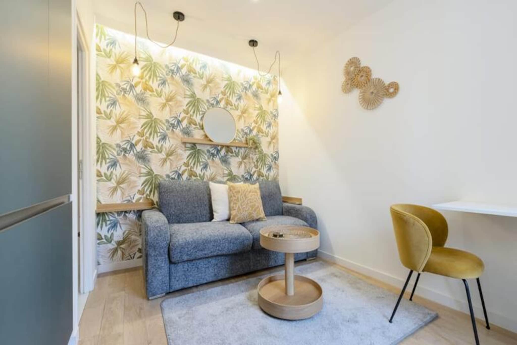 In the heart of Metz's historic center, where cobblestone streets meet centuries of history, Studio Canopée offers a serene and stylish retreat. Just steps from the iconic Rue Taison, this newly renovated studio blends modern design with a lush jungle-inspired aesthetic, creating a unique ambiance that invites relaxation and inspiration. Whether you're visiting for leisure or business, this verdant haven promises a memorable stay in one of France's most charming cities. 
 
 The studio is thoughtfully designed to provide both comfort and functionality. Its chic decor is complemented by a high-end sofa bed with a real mattress, ensuring restful nights. The fully equipped kitchen, featuring an oven, microwave, stovetop, Nespresso machine, and dishwasher, allows you to prepare meals with ease. The modern bathroom boasts a walk-in shower, and high-speed Wi-Fi makes it ideal for remote work or streaming your favorite shows. With private access via a secure lockbox, you’ll enjoy a seamless and independent stay. 
 
 Step outside and discover the treasures of Metz on foot. The majestic Saint-Étienne Cathedral, the bustling Place Saint-Louis, gourmet food halls, and the tranquil banks of the Moselle River are all within a five-minute walk. Immerse yourself in the city’s rich cultural, historical, and gastronomic offerings, from its vibrant markets to its picturesque riverfront. 
 
 Whether you're seeking a romantic getaway, a cultural escape, or a productive work trip, Studio Canopée is your perfect base. Book your stay today and let the charm of Metz and the comfort of this studio captivate you.