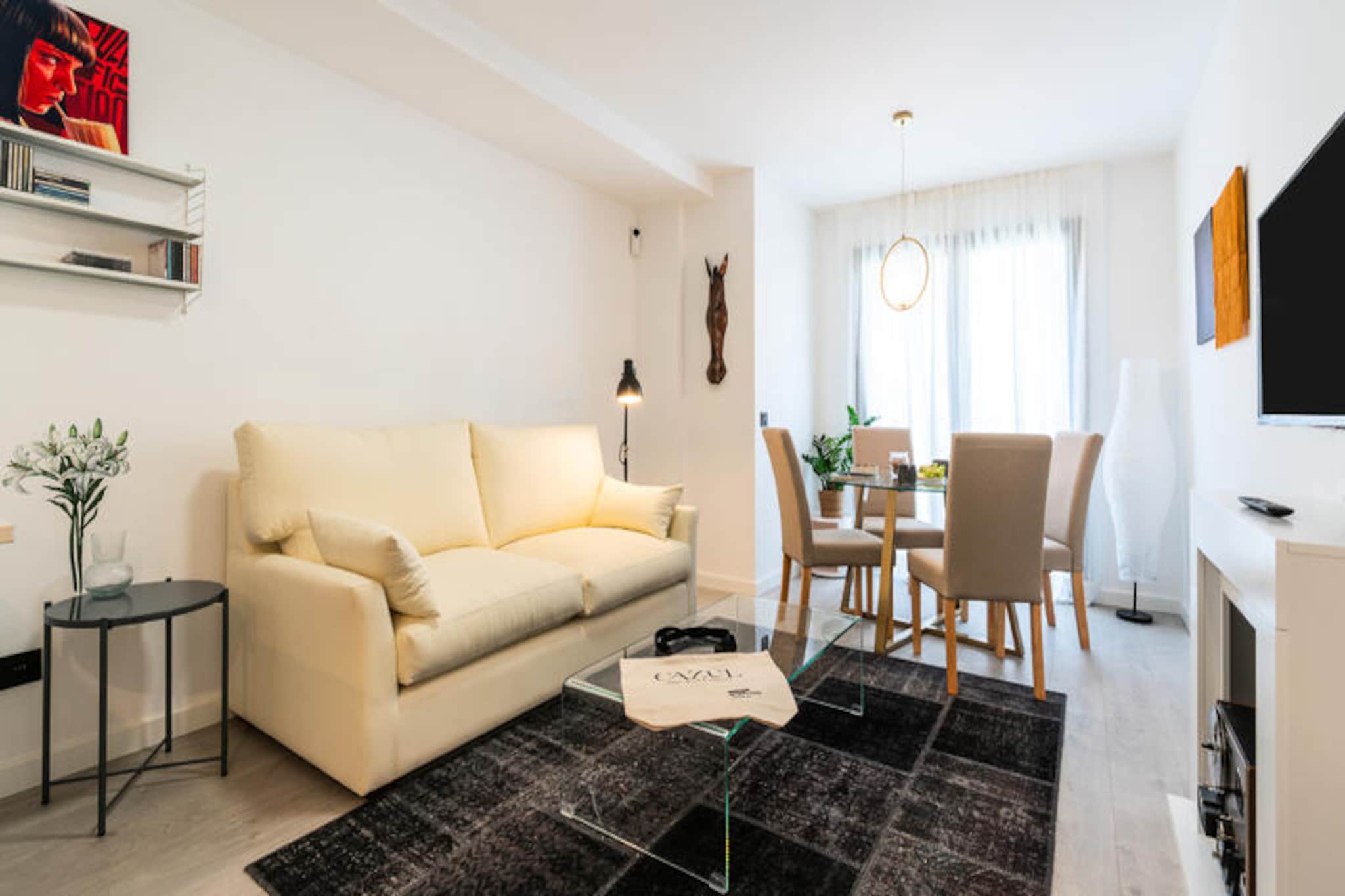 In the heart of vibrant Malaga, this charming one-bedroom apartment offers a perfect retreat for couples or solo travelers seeking a blend of comfort and city life. With its modern design and tasteful furnishings, the 57 m² space exudes a welcoming ambiance, ideal for unwinding after a day of exploring the lively streets of this Andalusian gem. Whether you're strolling through historic alleys or enjoying the Mediterranean breeze, this apartment is your gateway to the best of Malaga.
The apartment is thoughtfully equipped with everything you need for a comfortable stay. The bedroom provides a cozy haven for two, while the separate electric kitchen boasts modern appliances including a refrigerator, microwave, dishwasher, and coffee maker, making meal preparation a breeze. Relax in the air-conditioned living area, enjoy your favorite shows on one of the two televisions, or stay connected with high-speed Wi-Fi. Additional amenities like a washing machine, iron, safe, and hairdryer ensure a hassle-free experience.
Step outside, and you’ll find yourself immersed in Malaga’s vibrant atmosphere. Just steps away, discover local gems like Monos Garden and La Polivalente, or savor authentic Andalusian flavors at the nearby Picasso Bar Tapas. The golden sands of Playa la Malagueta are only 2 km away, perfect for a sun-soaked afternoon. With the Compás de la Victoria bus station and Málaga María Zambrano train station conveniently close, exploring the region is effortless.
Whether you're here for the culture, the cuisine, or the coast, this centrally located apartment promises an unforgettable stay in one of Spain's most captivating cities.