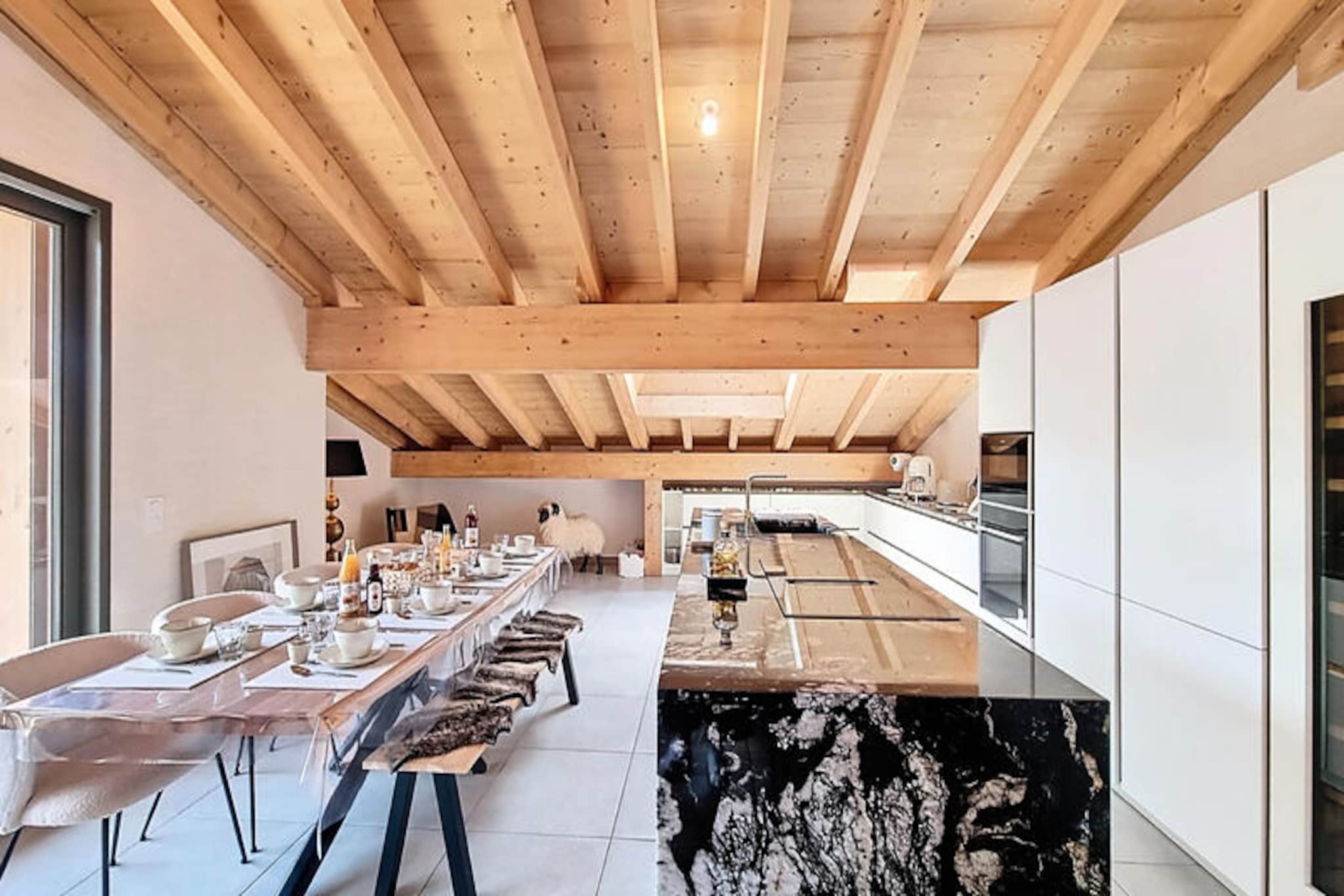 In the heart of the picturesque village of Les Gets, this stunning 90m² apartment offers a harmonious blend of modern elegance and alpine charm, creating the perfect retreat for families and groups of up to eight people. Imagine waking up to the crisp mountain air, surrounded by breathtaking views of the French Alps, and stepping into a world of relaxation and adventure. Whether you’re here for winter sports or summer hikes, this property promises an unforgettable escape. \n\nThe apartment boasts four beautifully designed bedrooms, including one with a cozy bunk bed and three with plush double beds, ensuring restful nights for all. With three bathrooms—two featuring showers and one with a luxurious bathtub—you’ll find ample space for unwinding after a day of exploring. The open-plan American-style kitchen is fully equipped with modern appliances, including a refrigerator, freezer, dishwasher, oven, microwave, coffee maker, and kettle, making it easy to prepare hearty meals to enjoy in the inviting dining area. Wi-Fi and private parking add to the convenience, while the elegant furnishings create a warm and welcoming atmosphere. \n\nJust 280 meters from Carrefour Montagne and 550 meters from the Chavannes gondola, the apartment’s prime location ensures easy access to shops, ski lifts, and public transportation. Les Gets itself is a vibrant village with a rich alpine heritage, offering a variety of restaurants, boutiques, and activities for every season. In winter, the slopes beckon with pristine snow, while summer transforms the region into a haven for hikers and cyclists. \n\nWhether you’re seeking thrilling adventures or peaceful moments surrounded by nature, this apartment is your gateway to the best of Les Gets. With its thoughtful amenities and unbeatable location, it’s the ideal choice for creating cherished memories in the heart of the Alps.