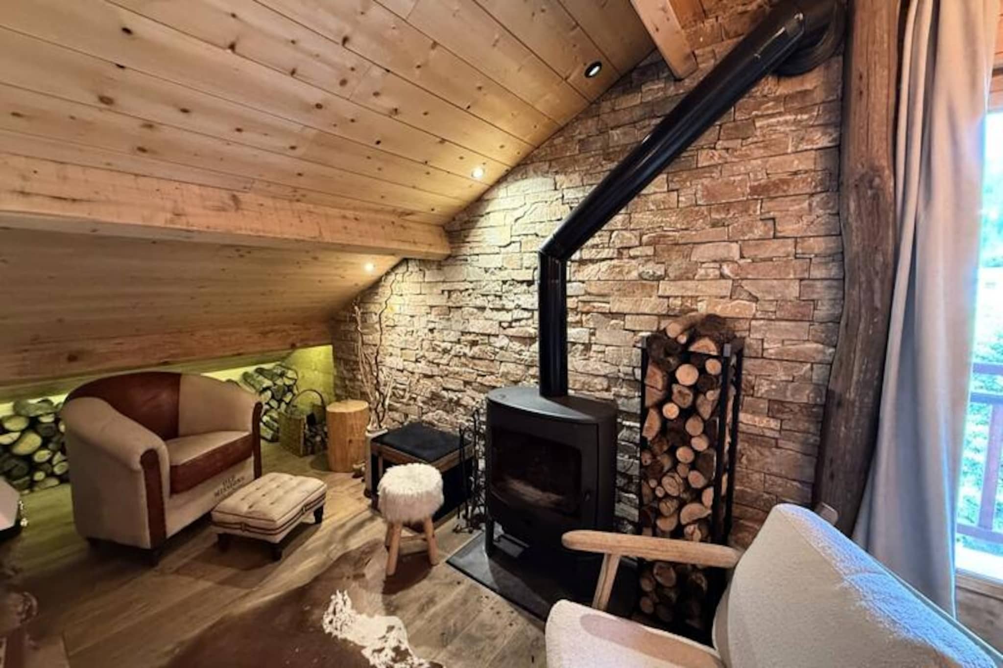 In the heart of the charming Valberg resort, this beautifully renovated apartment offers a perfect blend of modern comfort and alpine charm. Situated on the main avenue, just steps from the slopes, it invites you to immerse yourself in the serene mountain atmosphere while enjoying all the conveniences of a well-equipped retreat. Whether you're here for a winter ski adventure or a summer escape in the fresh mountain air, this residence promises unforgettable moments for families and groups alike. 
 
 The apartment, located on the 4th floor of a residence (please note, no elevator), boasts high-quality finishes and a warm, inviting ambiance. With two spacious bedrooms, it comfortably accommodates up to eight guests. The first bedroom features a double bed, a single bed, and a pull-out single bed, while the expansive upstairs bedroom offers a double bed and four single beds, including a pull-out option. The fully equipped kitchen allows you to prepare hearty meals after a day of activities, and the bright living room, complete with a wood-burning stove, provides the perfect setting to relax and enjoy the stunning views of the surrounding nature. Modern amenities such as Wi-Fi, a walk-in shower, and a washing machine ensure a comfortable stay, while the ski locker adds convenience for winter sports enthusiasts. 
 
 Located just 400 meters from the La Croix du Sapet chairlift and 1 km from the resort center, the apartment's location is ideal for exploring Valberg. A seasonal free shuttle stops right in front of the residence, making it easy to access the lively resort center with its shops, restaurants, and family-friendly activities. Valberg, just 1.5 hours from Nice, is a picturesque destination offering year-round appeal, from snowy slopes to scenic hiking trails. 
 
 Whether you're drawn by the thrill of skiing, the tranquility of mountain vistas, or the charm of a family-friendly alpine village, this apartment is the perfect base for your next getaway. Book your stay and create cherished memories in the heart of the French Alps.