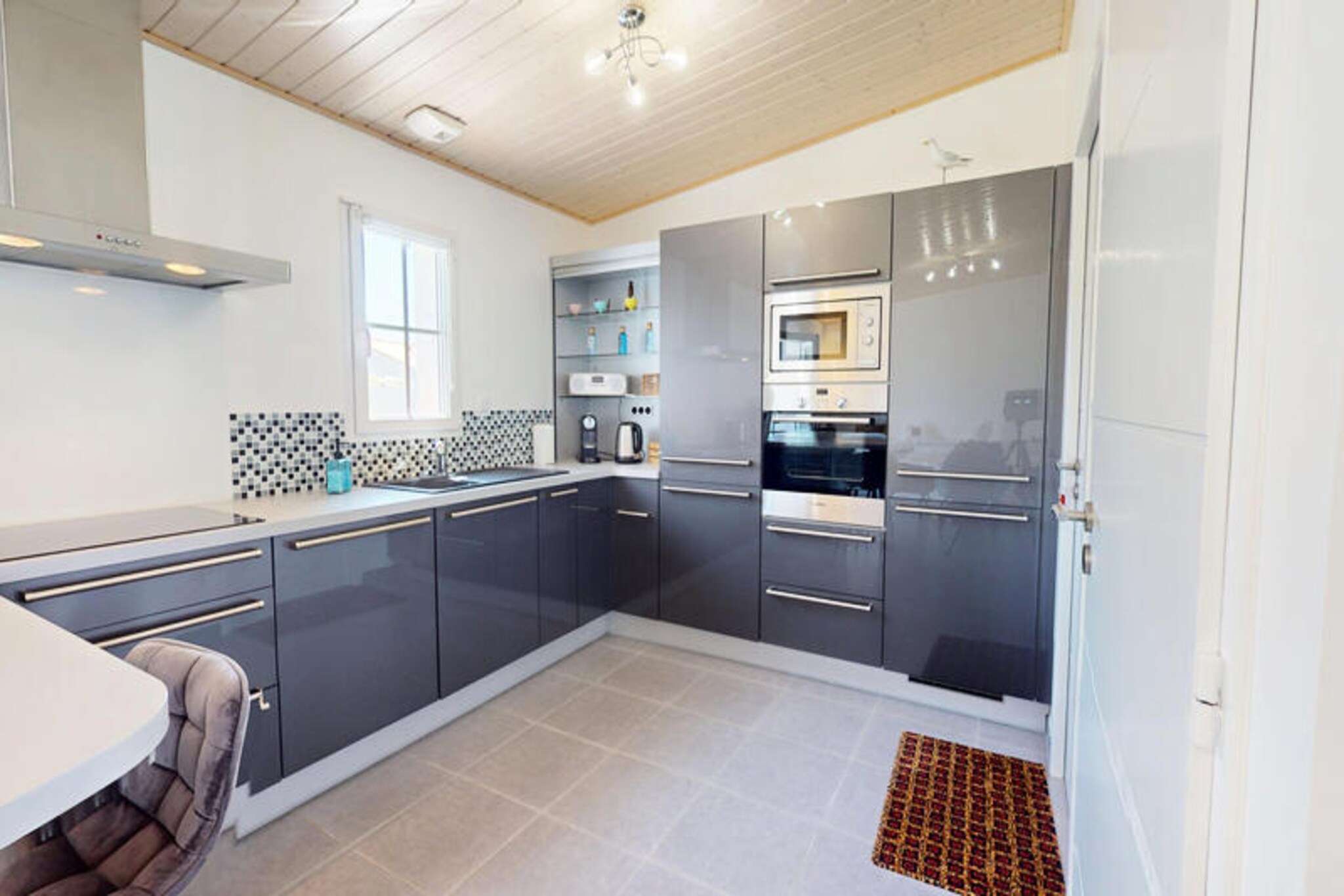 In the heart of Saint-Hilaire-de-Riez, where the ocean breeze mingles with the scent of pine forests, Oceana de l'Isle de Riez invites you to experience a serene coastal retreat. This spacious family home, just moments from the sea, offers the perfect setting for reconnecting with loved ones amidst the natural beauty of the Vendée coastline. Whether you’re seeking relaxation or adventure, this charming property caters to all. 
 
 Inside, the house is designed with togetherness in mind. Three comfortable bedrooms await, including two with double beds and a family room featuring a double bed with a bunk above, ideal for children or larger groups. The open-plan living area is warm and inviting, with a fully equipped kitchen, a cozy dining space, and a bar area perfect for morning coffee or evening drinks. Modern amenities such as a television and a bright, contemporary bathroom ensure a comfortable stay for up to eight guests. 
 
 Step outside to discover a private enclosed garden, a haven for families with children. The pergola-covered terrace provides shade and shelter, making it the perfect spot for al fresco dining. A large table, comfortable seating, and a barbecue set the stage for memorable meals under the Vendée sky. 
 
 The surrounding area is brimming with activities for all ages. Stroll along the dramatic Vendée Corniche, relax on nearby beaches like Les 5 Pineaux, or embark on a cycling adventure through scenic trails to Saint-Gilles-Croix-de-Vie. For family fun, visit Explora Parc for tree climbing and games, or let the kids explore Dino’s Park and Atlantic Toboggan water park. Unique experiences like the Commequiers railbike add a touch of adventure to your stay. 
 
 Oceana de l'Isle de Riez is more than a holiday home; it’s a gateway to creating cherished memories by the sea. With its blend of comfort, charm, and unbeatable location, it promises a holiday you’ll never forget.