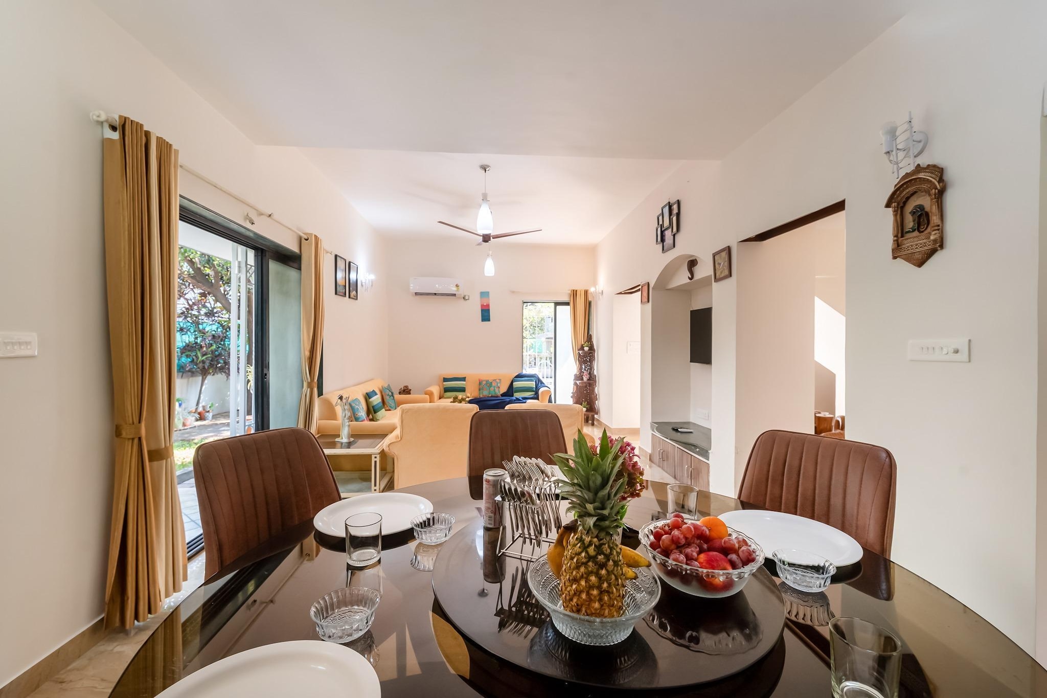 Ground floor: (Living room(single sofa bed, TV, dining table), Kitchen(electric kettle, coffee machine, fridge), bedroom(double bed, TV(flatscreen)), bedroom(double bed, TV(flatscreen)), bedroom(double bed, TV(flatscreen)), bedroom(double bed, TV(flatscreen)), bathroom(shower, washbasin, toilet, shampoo, body soap), bathroom(shower, washbasin, toilet, shampoo, body soap), bathroom(shower, washbasin, toilet), bathroom(shower, washbasin, toilet), swimming pool(private), iron)