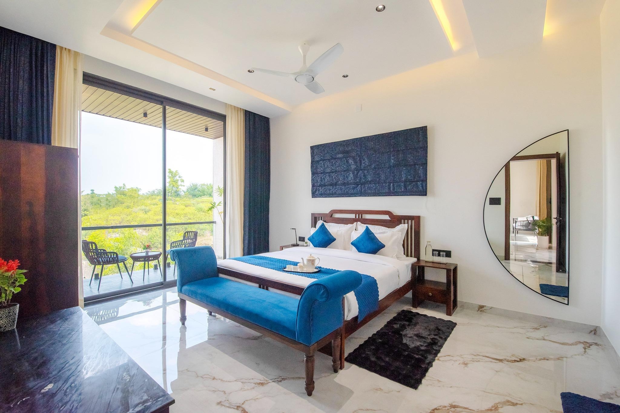 Experience unparalleled luxury at Dancenter Villa Papillon, a stunning 5BHK retreat nestled in the heart of Udaipur where opulence meets serenity. Spread across 6000 sq. ft., the villa features four lavish bedrooms and a dedicated kidsâ€™ room, each designed for ultimate comfort and style. With an inviting private pool, elegant dining area, and curated amenities, this villa offers the perfect blend of sophistication and relaxation â€” ideal for family vacations, group getaways, or a laid-back staycation amidst the City of Lakes.
Stay Experience:
Villa Papillon redefines comfort with its spacious living areas, featuring plush sofa seating, a 75â€ LED TV, and panoramic views of the pool. Each bedroom is thoughtfully designed with ensuite bathrooms, air-conditioning, and private balconies or pool access. The open modular kitchen is fully equipped with modern appliances, while a full-time chef ensures guests enjoy fresh, delectable meals without lifting a finger. Whether itâ€™s lounging by the pool, hosting a private barbecue or bonfire night, or enjoying movie time with the portable speaker setup â€” every moment here exudes relaxed indulgence.
Connectivity & Nearby Attractions:
Located just minutes from Udaipurâ€™s most iconic attractions, Dancenter Villa Papillon offers both convenience and tranquility.
â€¢	Maharana Pratap Airport: 45 mins (30 km)
â€¢	Udaipur Junction: 30 mins (15 km)
â€¢	Badi Lake: 5 mins
â€¢	Fateh Sagar Lake & Bahubali Hills: 8 mins
â€¢	Saheliyon Ki Bari & Club Parallel: 10 mins
Guests can also explore Neemach Mata Ropeway, local cafÃ©s, and Udaipurâ€™s vibrant dining and nightlife â€” all within a short drive.
Facilities & Amenities:
â€¢	Private outdoor pool
â€¢	Full-time chef (vegetarian meals only)
â€¢	Outdoor barbecue & bonfire setup (on request, chargeable)
â€¢	Portable speaker
â€¢	Board games
â€¢	75â€ LED TV
â€¢	Coffee/tea maker
â€¢	Refrigerator & RO purifier
â€¢	Toaster & induction stove
â€¢	Cutlery and crockery
â€¢	Hair dryer
â€¢	High-speed Wi-Fi
â€¢	Toiletries & towels
â€¢	Geysers in all bathrooms
â€¢	Parking facility
â€¢	24/7 power backup
â€¢	Dedicated caretaker

Ideal For:
Families and groups seeking a luxurious and peaceful escape in Udaipur, with private amenities, curated dining, and proximity to top attractions.
