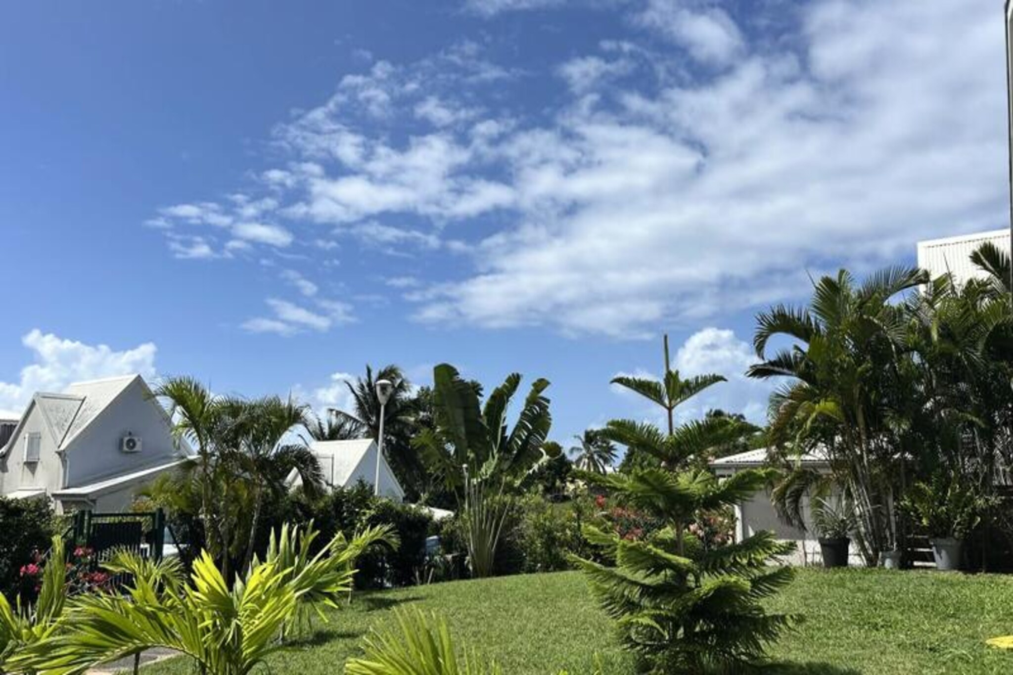 In the heart of the Caribbean, where turquoise waters meet lush greenery, Villa Alyken offers a serene escape in the picturesque town of Sainte-Anne, Guadeloupe. This charming villa is a haven for families or friends seeking tranquility and tropical bliss. From the moment you step into this 81 m² retreat, you’ll feel the warm embrace of its inviting ambiance and thoughtful design. 
 
 The villa comfortably accommodates up to six guests with three air-conditioned bedrooms, each featuring a plush queen-size bed for restful nights. Two modern bathrooms with walk-in showers provide convenience and privacy, while the bright and open living area invites you to unwind in style. The fully equipped kitchen, complete with a traditional oven, microwave, and Nespresso machine, is perfect for preparing meals to savor on the terrace. For evenings under the stars, the charcoal BBQ and private jacuzzi promise unforgettable moments of relaxation and connection.
 
 Villa Alyken’s location is ideal for exploring the beauty of Sainte-Anne. Just a short distance away, you’ll find pristine beaches, vibrant local markets, and charming restaurants serving authentic Creole cuisine. Adventurers can indulge in water sports, hiking trails, and cultural excursions, all within easy reach. Essential amenities such as supermarkets, bakeries, and pharmacies are conveniently nearby, ensuring a seamless stay.
 
 With reliable Wi-Fi, hotel-quality linens, and a dedicated concierge service, Villa Alyken provides everything you need for a stress-free holiday. Whether you’re soaking in the jacuzzi, enjoying a refreshing cocktail upon arrival, or exploring the wonders of Guadeloupe, this villa promises an unforgettable Caribbean getaway. Book now and let the magic of Sainte-Anne captivate you.