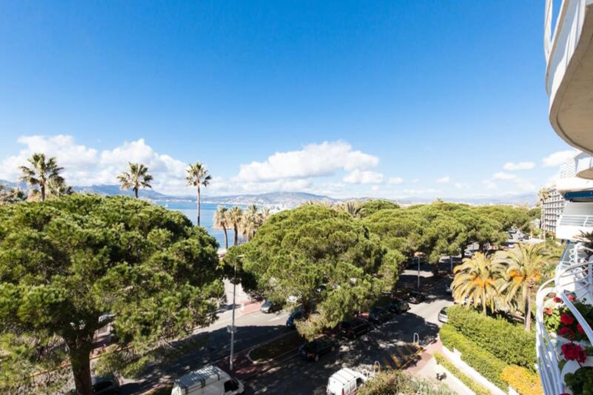 Awaken to the gentle sound of waves and the golden glow of the Mediterranean sun in this elegant 55m² apartment located on Cannes’ iconic Boulevard de la Croisette. With the beaches just steps from your door, indulge in morning swims or leisurely strolls along the seafront, soaking in the glamour of this world-renowned destination. Whether you're exploring the vibrant city center or relaxing on the terrace with its breathtaking sea views, this property offers an unparalleled coastal retreat. \n\nInside, the apartment is thoughtfully designed for comfort and style. The living room features a cozy sofa bed, flat-screen TV, and dining area for four, seamlessly connecting to the terrace where you can dine al fresco or unwind with garden furniture overlooking the azure waters. The separate kitchen is fully equipped for culinary adventures, while the serene bedroom boasts a queen-size bed, ample wardrobe space, and direct terrace access. A modern bathroom completes the space, ensuring convenience and relaxation during your stay. \n\nPerfectly situated, the apartment is just minutes from Cannes’ finest attractions. Stroll down Rue d’Antibes for luxury shopping, visit Port Canto for boat rentals, or immerse yourself in the cultural allure of the Palais des Congrès. With free street parking and nearby paid options, exploring the region is effortless. The property is also conveniently located near Cannes train station and Nice Côte d'Azur Airport, with concierge services available to arrange transfers. \n\nWhether you’re here for the beaches, the glamour, or simply to unwind, this apartment promises an unforgettable escape in the heart of the French Riviera.