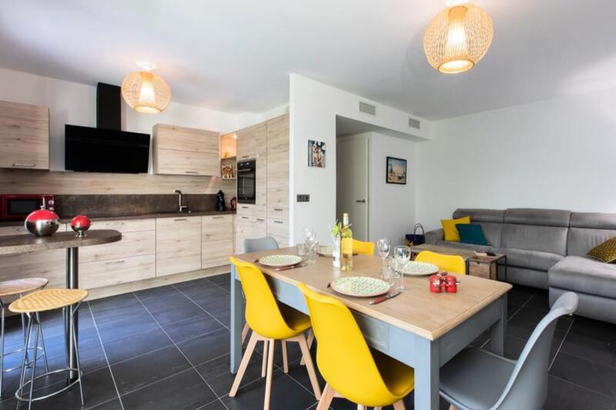 Step into a world of coastal charm and effortless relaxation at this delightful garden-level apartment in Cannes. With its serene ambiance and thoughtful design, this 70m² retreat invites you to unwind and savor the Mediterranean lifestyle. Imagine mornings spent basking in the sun on your private terrace, afternoons strolling to Mourré Rouge beach just two minutes away, and evenings enjoying the vibrant local scene of Palm Beach village. Whether you’re here for leisure or adventure, this apartment offers the perfect base for your Riviera escape. \n\nInside, the apartment boasts a spacious living area with large bay windows that flood the space with natural light and open onto the lush garden. The living room is a cozy haven, complemented by a fully equipped open-plan kitchen and a dining area that seats six. The 75m² garden is a true highlight, featuring a family table for eight, sun loungers, and private access to the beach. The first bedroom offers a queen-size bed, ample wardrobe space, and terrace access, while the second bedroom features two double beds on a mezzanine with its own terrace access. A modern shower room, designed for accessibility, completes the layout, ensuring comfort for all guests. \n\nBeyond the apartment, the location is unbeatable. A short walk takes you to Mourré Rouge beach for sun-soaked relaxation or Palm Beach village for charming shops and local delicacies. Stroll along the Croisette for family-friendly fun or retreat to the tranquil Jardin des Hespérides. Within a 10-minute drive, you can explore the Palais des Congrès, the city center, or hop on a train to discover the French Riviera’s treasures. \n\nWith private underground parking, high-speed Wi-Fi, and a swimming pool in the residence, this apartment combines convenience with luxury. Whether you’re here to soak up the sun, explore Cannes, or simply relax, this property promises an unforgettable stay.