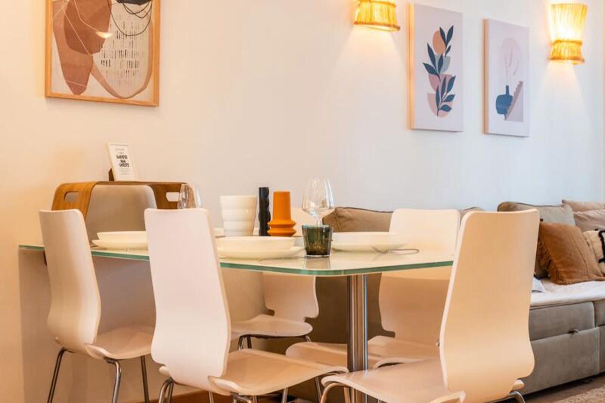 Step into the heart of Cannes and discover this elegant two-bedroom apartment, perfectly situated just steps from the iconic Croisette. With its vibrant surroundings and proximity to the city’s finest attractions, this property offers an ideal base for exploring Cannes with friends or loved ones. Imagine sipping your morning coffee on the east-facing terrace, overlooking the renowned Martinez Hotel, while soaking in the partial sea views and the lively atmosphere of Rue Latourg-Maubourg. Whether you’re here for the glamour of the Palais des Festivals or the charm of the local streets, this apartment places you at the center of it all. \n\nInside, the apartment exudes warmth and sophistication with its tasteful décor and thoughtfully designed spaces. The spacious living area is divided into three distinct zones: a cozy living room with a plush sofa and flat-screen TV, a fully equipped open-plan kitchen complete with an oven and microwave, and a dining area for four that opens onto the terrace. Both bedrooms feature queen-size beds, built-in wardrobes, and soft linens to ensure restful nights. The larger bedroom even includes a flat-screen TV for added comfort. A modern bathroom with a large shower completes the space, offering everything you need for a relaxing stay. \n\nStep outside and you’ll find yourself surrounded by trendy bars, restaurants, and boutique shops. Stroll along the Croisette, shop on Rue d’Antibes, or enjoy breakfast and cocktails on Rue Hoche—all within minutes of your doorstep. For those seeking a lively nightlife, the area’s vibrant energy extends into the evening, with nearby establishments creating an exciting ambiance. \n\nWhether you’re visiting for the glamour, the cuisine, or the coastal charm, this apartment offers a seamless blend of comfort and convenience, making it the perfect choice for your Cannes getaway.