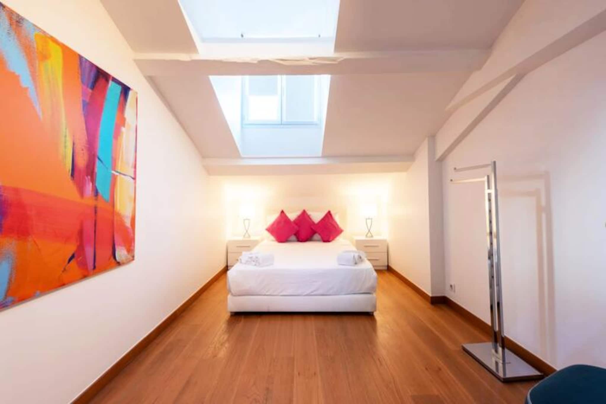 Amidst the vibrant charm of Cannes, this elegant top-floor apartment on Rue d'Antibes offers a serene retreat just moments from the city's most iconic attractions. Imagine stepping out of your door and strolling 300 meters to the Palais des Festivals or the sun-drenched Croisette, while the bustling Rue d'Antibes, renowned for its luxury shopping, is practically at your doorstep. This is the perfect blend of sophistication and convenience, ideal for those seeking to immerse themselves in the glamour of the French Riviera. \n\nSpanning 70 m², the apartment has been meticulously renovated to combine modern comfort with timeless style. Accommodating up to four guests, it features a spacious living room adorned with tasteful décor, a large sofa, and a smart TV for cozy evenings in. The open-plan kitchen is fully equipped, seamlessly connecting to the dining area for four. The tranquil bedroom boasts a queen-size bed, while the living room offers an equally comfortable queen-size sofa bed. A luxurious bathroom with both a shower and bathtub, along with a separate toilet, ensures practicality and relaxation. Additional amenities include fiber optic Wi-Fi, air conditioning, a dishwasher, washing machine, dryer, and elevator access. \n\nThe location is unparalleled. Cannes train station is just a three-minute walk away, and the Gray d'Albion parking garage is conveniently located 50 meters from the building. Within a short stroll, you'll discover a plethora of fine dining options, lively bars, and local shops, making it easy to enjoy the city's vibrant lifestyle. For those arriving by air, Nice Côte d'Azur Airport is a mere 30-minute drive. \n\nWhether you're visiting for business or leisure, this apartment offers a quiet haven amidst the excitement of Cannes. With concierge services available and thoughtful touches such as linens and everyday essentials provided, your stay promises to be as effortless as it is unforgettable. Experience the allure of the French Riviera from this stylish and centrally located retreat.