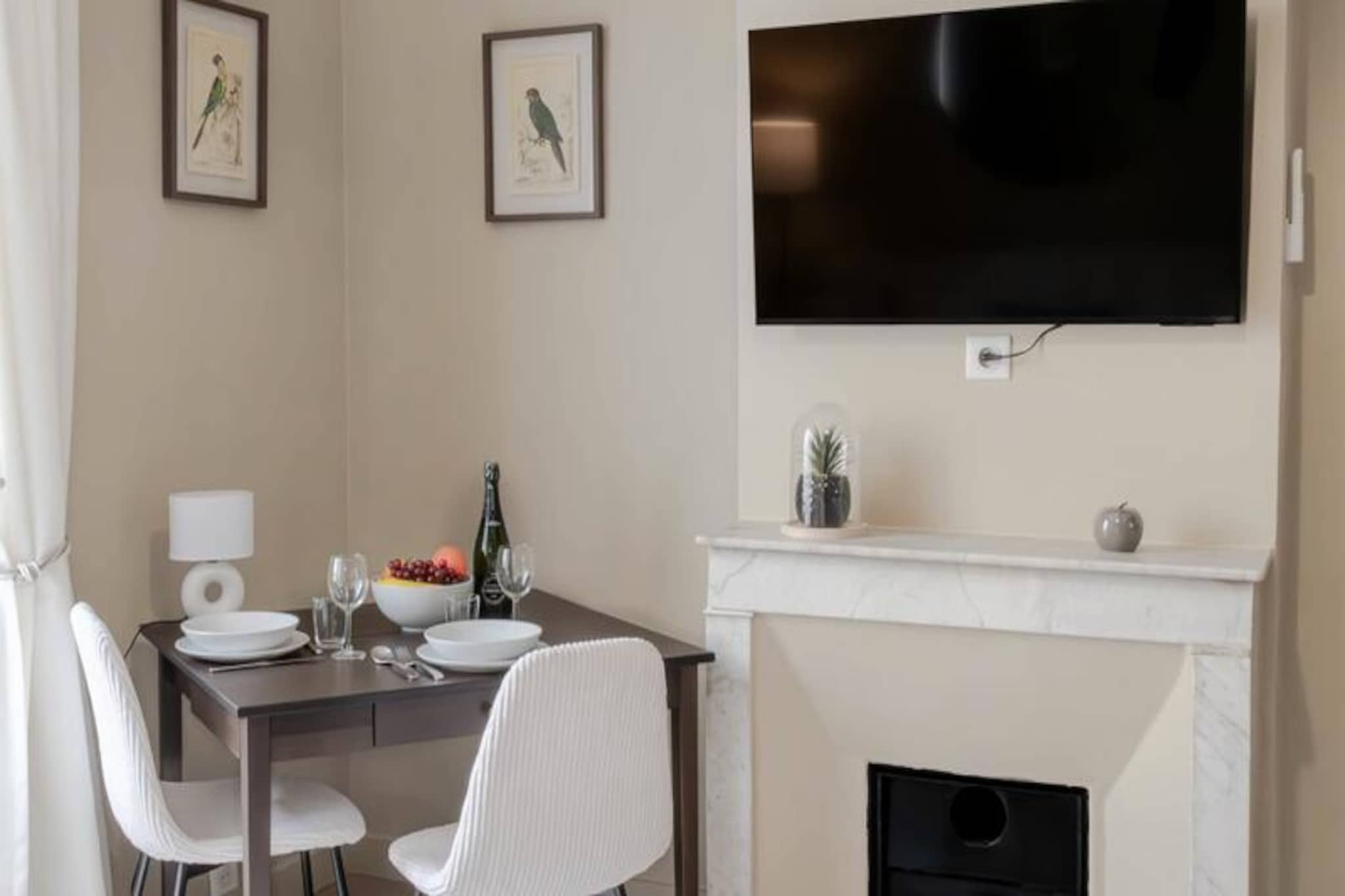 In the heart of Cannes' vibrant Rue d'Antibes, this beautifully renovated apartment offers a perfect blend of modern comfort and timeless charm. Whether you're visiting for a relaxing holiday or a business trip, this central location immerses you in the lively atmosphere of Cannes, with its boutique-lined streets and Mediterranean allure. Just a short stroll from the iconic Croisette and its golden beaches, this property invites you to experience the best of the French Riviera. 
 
 Step inside this thoughtfully designed 35m² space, located on the third floor of a characterful period building. The apartment features a bright living room with a comfortable sofa bed, a smart TV for cozy evenings, and a dining area that doubles as a workspace. The open-plan kitchen is fully equipped with modern appliances, perfect for preparing meals after a day of exploring. The inviting bedroom boasts a king-size bed for restful nights, while the sleek shower room and additional separate toilet ensure convenience for all guests. Reversible air conditioning in both the living room and bedroom guarantees a comfortable stay year-round.
 
 From your doorstep, discover the charm of Rue d'Antibes with its array of shops and restaurants. A five-minute walk takes you to the Croisette, where you can enjoy sun-soaked beaches or indulge in water sports. Explore the historic Le Suquet district, visit the bustling Forville Market, or take a ferry to the serene Lérins Islands. With the Palais des Festivals just a ten-minute walk away, this apartment is also ideal for event attendees. 
 
 Offering a prime location, modern amenities, and the enchanting spirit of Cannes, this apartment is your gateway to an unforgettable Riviera escape.