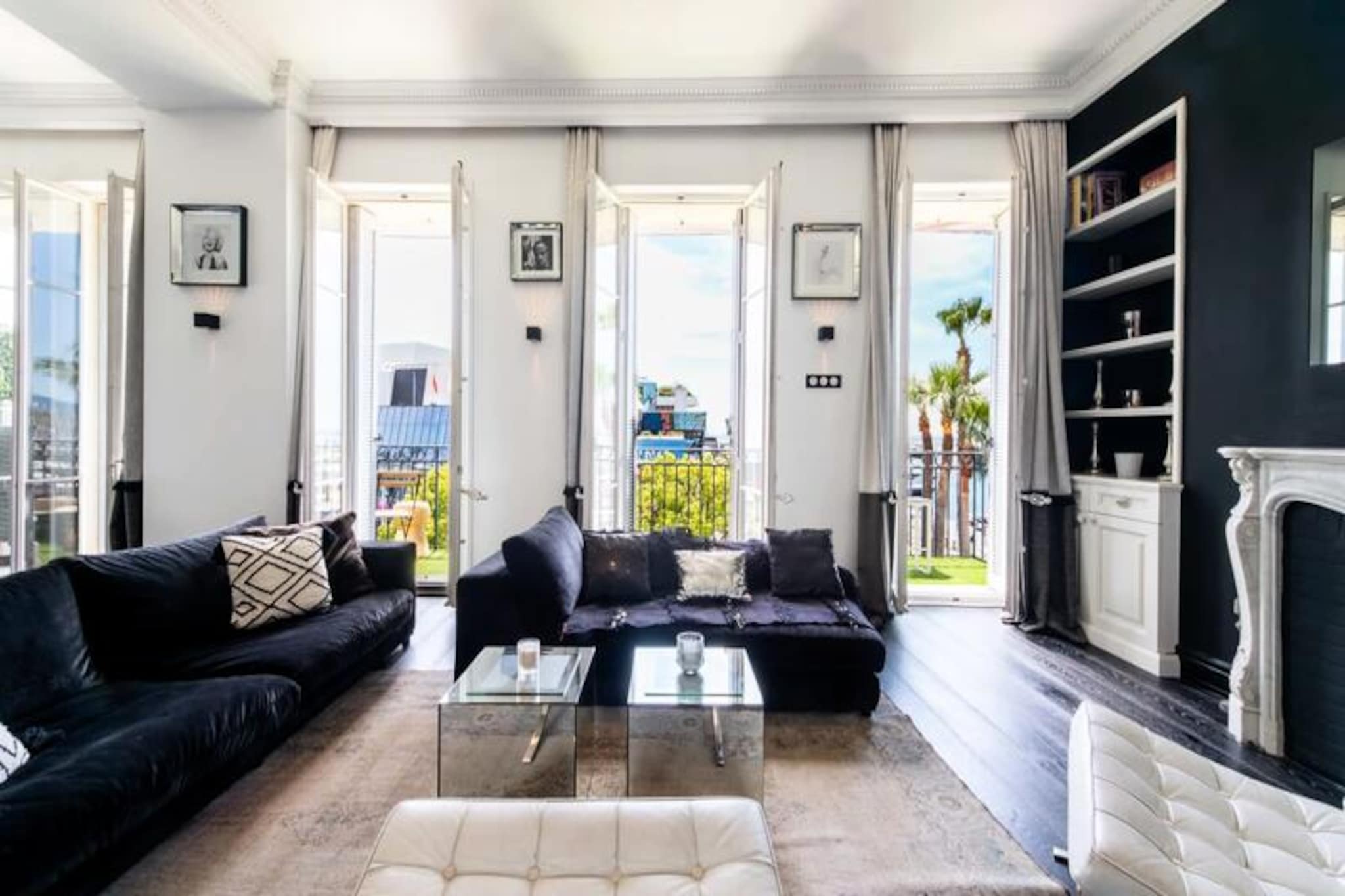 Awaken to the shimmering Mediterranean Sea and the vibrant energy of Cannes from this luxurious apartment, perfectly situated opposite the iconic Palais des Festivals. Here, the pulse of the city meets the tranquility of panoramic views, as yachts gently sway in the port below and the Croisette buzzes with life. Whether you’re sipping coffee on the balcony at sunrise or enjoying a glass of wine under the evening lights, every moment feels like a celebration of elegance and charm. \n\nStep inside to discover a modern sanctuary designed for comfort and sophistication. The spacious living and dining areas are bathed in natural light, thanks to floor-to-ceiling bay windows that seamlessly connect the interior to the stunning outdoor scenery. A professional-grade kitchen invites culinary creativity, whether you’re preparing meals yourself or indulging in the services of a private chef. The apartment’s three bedrooms offer a serene retreat, including a master suite with a king-size bed, dressing room, and en-suite bathroom, ensuring privacy and luxury for all guests. \n\nBeyond the apartment, Cannes unfolds at your doorstep. The Palais des Festivals is just steps away, making this the ideal location for event attendees. Stroll along La Croisette to explore luxury boutiques, fine dining, and private beaches, or wander to Le Suquet for a taste of the city’s historic charm. For a tranquil escape, ferries to the Îles de Lérins depart nearby, offering a serene nature getaway. \n\nWhether visiting for business or leisure, this apartment is your gateway to the best of Cannes. With high-end amenities, a prime location, and a dedicated concierge service to cater to your every need, your stay promises to be nothing short of extraordinary.