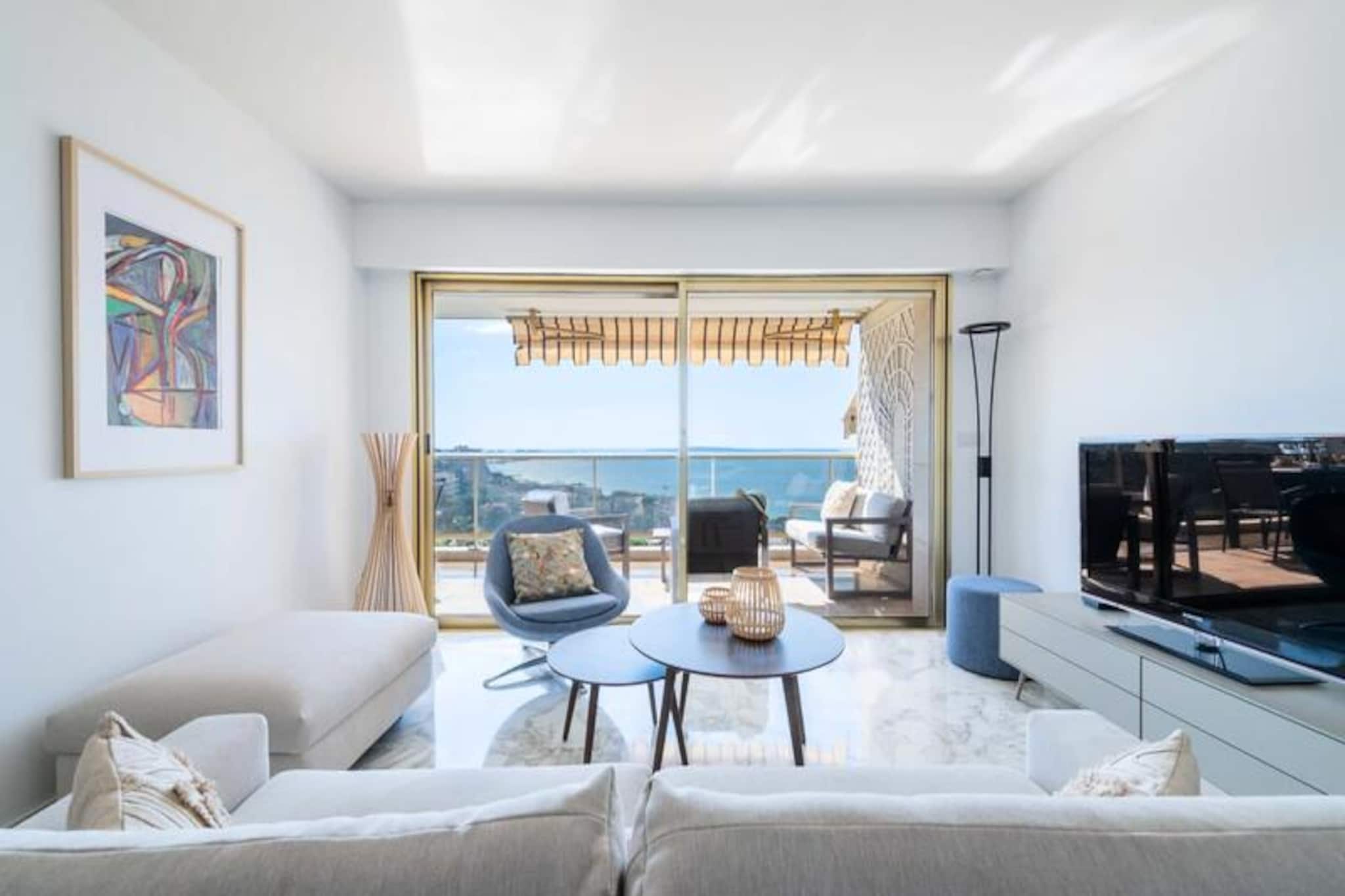 High above the sparkling coastline of Cannes, this elegant apartment offers a serene retreat with breathtaking views of the Mediterranean Sea. From the moment you step onto the terrace, the panorama stretches across azure waters, framed by the residence’s lush gardens and inviting swimming pool. Whether you’re sipping morning coffee or enjoying a sunset aperitif, the peaceful atmosphere is perfect for creating cherished moments with family and friends. Just minutes away from the vibrant city center and golden beaches, this property combines tranquility with accessibility. \n\nInside, the apartment exudes sophistication and comfort. Located on the third floor of a secure, upscale residence, it features air conditioning throughout, ensuring a cool haven during warm summer days. The living room, bathed in natural light, opens onto the terrace, offering a seamless indoor-outdoor living experience. A fully equipped kitchen awaits culinary enthusiasts, while two spacious bedrooms provide restful sanctuaries. The master bedroom boasts a king-size bed, en-suite shower room, and direct access to the terrace, while the second bedroom offers a queen-size bed, en-suite bathroom, and a private balcony overlooking greenery. Quality furnishings and understated décor enhance the sense of space and elegance. \n\nThe location is ideal for exploring Cannes’ highlights. A short drive takes you to Plage du Midi, perfect for leisurely swims and waterfront dining, or to Le Suquet, where cobbled streets lead to stunning views of the bay. The bustling Marché Forville and Rue d’Antibes offer local flavors and shopping delights, while the iconic Palais des Festivals hosts world-renowned events. For nature lovers, the Lérins Islands are just a ferry ride away, promising tranquil escapes and scenic trails. \n\nWhether you’re seeking relaxation or adventure, this apartment is your gateway to the best of Cannes. With private underground parking, concierge services, and thoughtful amenities, it ensures a seamless and memorable stay in the French Riviera.