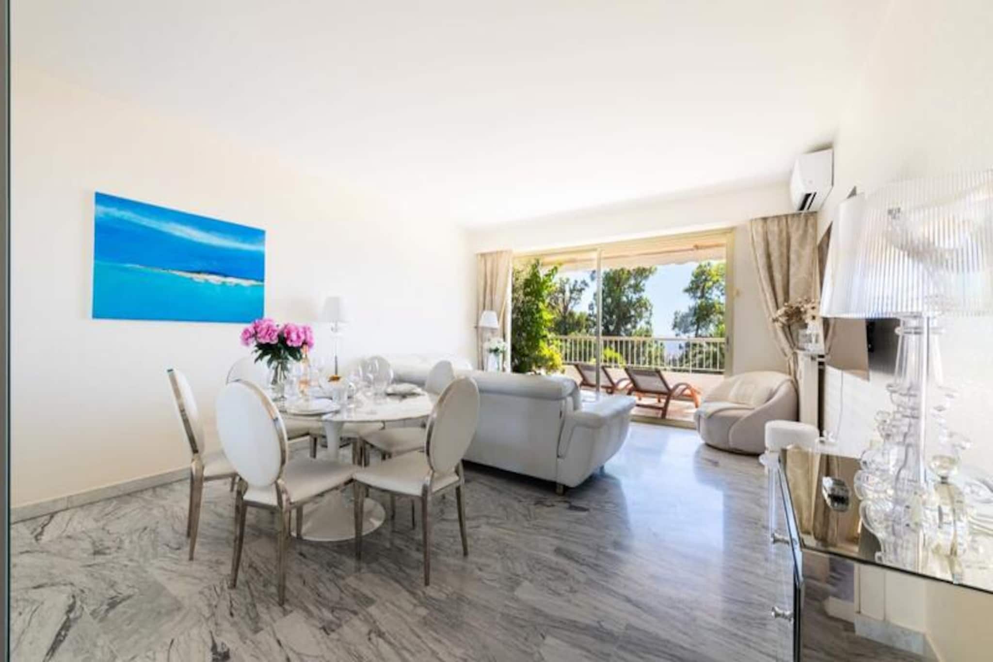 High above the sparkling coastline of Cannes, this elegant apartment offers a serene retreat with breathtaking views of the Mediterranean. Bathed in natural light from dawn until dusk, the south-facing terrace is the perfect spot to savor your morning coffee or unwind with a glass of wine as the sun sets over the sea. Nestled in the prestigious Californie district, this property combines tranquility with proximity to the vibrant heart of Cannes, making it an ideal choice for those seeking both relaxation and adventure on the French Riviera.
Step inside to discover a spacious and tastefully decorated 75 sq m living area, designed for comfort and style. The open-plan living room features a plush sofa, a large smart TV, and a dining area that seamlessly connects to the expansive terrace, perfect for al fresco dining. A separate, fully equipped kitchen opens onto a shaded north-facing balcony, offering a cool retreat for cooking outdoors. The bedroom, with its luxurious queen-size bed, also enjoys direct terrace access, inviting you to wake up to stunning sea views. Modern amenities such as reversible air conditioning, high-speed Wi-Fi, and a private underground parking space ensure a stress-free stay.
Beyond the apartment, the delights of Cannes await. In just 10 minutes by car, you can explore the iconic La Croisette, the charming Forville Market, or the historic streets of Le Suquet. The nearby ferry terminal offers easy access to the idyllic Lérins Islands, while the Palais des Festivals hosts world-renowned events year-round. Local shops, bakeries, and cafes are just a short drive away, ensuring convenience without compromising the peaceful ambiance of your hillside retreat.
Whether you're here for the glamour of the Cannes Film Festival, a romantic getaway, or a family escape, this apartment offers the perfect base to create unforgettable memories on the Côte d'Azur.