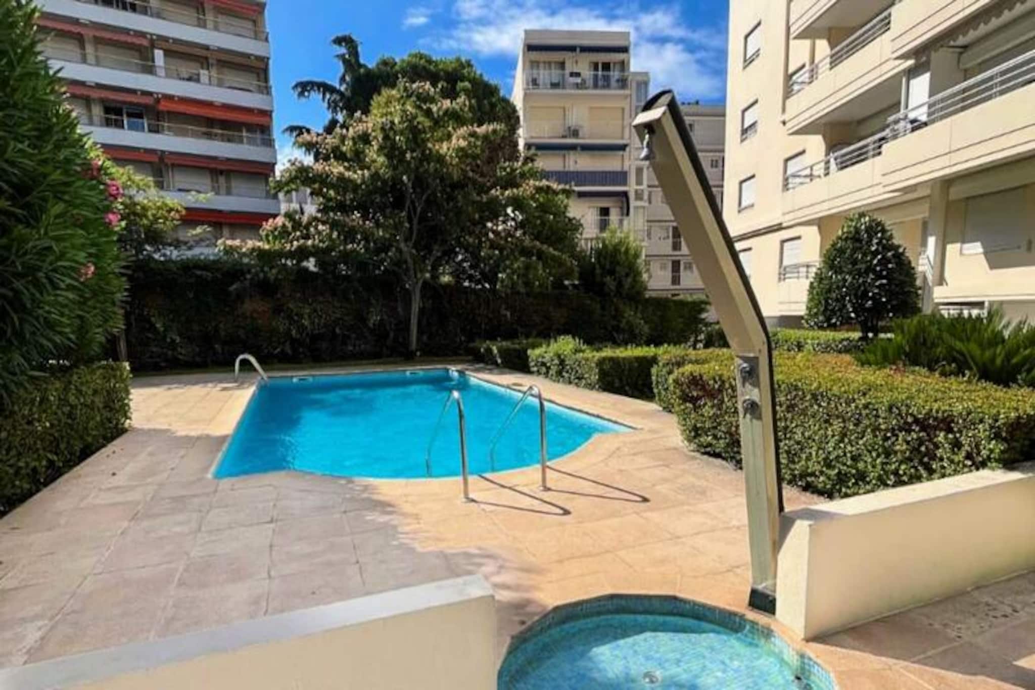Just a few steps from the iconic Croisette and its golden beaches, this bright and functional apartment offers the perfect base to experience the glamorous lifestyle of Cannes. Imagine starting your day with a refreshing swim in the residence’s private pool, enjoying breakfast on your sunlit south-facing terrace, and strolling along the waterfront promenade—all without needing a car. This is where relaxation meets elegance in the heart of the French Riviera.
Located on the first floor of a well-maintained residence with an elevator, the apartment is thoughtfully designed for comfort and convenience. The living area features a cozy sofa bed, a dining space, and a large bay window that opens onto the terrace, perfect for al fresco meals. The separate kitchen is fully equipped and also has direct terrace access. The bedroom boasts a queen-size bed and built-in storage, while the modern shower room includes a sink and toilet. Additional amenities such as reversible air conditioning, Wi-Fi, and a secure underground parking space for a small car ensure a seamless stay.
Step outside, and you’re just a 3-minute walk from the Croisette’s beaches, where you can unwind at beach clubs or explore the vibrant Rue d’Antibes with its chic boutiques and local shops. Port Canto, with its yachts and seaside dining, is a leisurely 10-minute stroll away, while the Palais des Festivals is within a 15-minute walk, making this an ideal spot for both leisure and business travelers. Supermarkets, bakeries, and pharmacies are also conveniently close, ensuring all your needs are met.
Whether you’re here to soak up the sun, indulge in world-class shopping, or attend Cannes’ renowned events, this apartment places you at the center of it all. With its unbeatable location and thoughtful amenities, it’s the perfect retreat for your Riviera getaway.