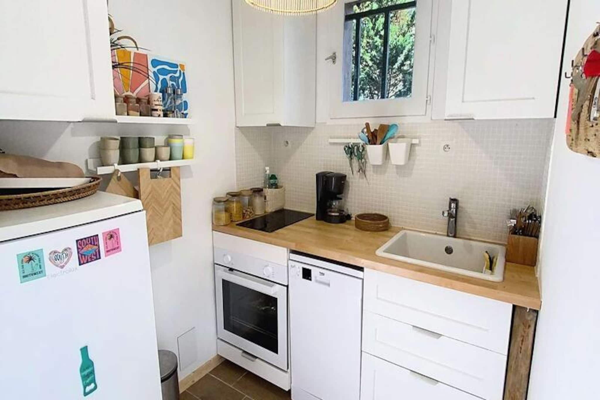 Amid the serene landscapes of southwestern France, this charming semi-detached house offers a delightful retreat for up to six guests. With its beautifully renovated interiors and multi-level layout, the property invites you to experience both comfort and character in equal measure. Whether you're seeking a peaceful escape or an active holiday, this home provides the perfect balance of relaxation and adventure. Picture yourself enjoying leisurely mornings on the shaded terrace, surrounded by the gentle rustle of trees and the scent of fresh countryside air. The atmosphere here is one of tranquility and timeless charm. \n\nInside, the house is thoughtfully designed to cater to your every need. The entrance leads to a fully equipped, separate kitchen, ideal for preparing delicious meals with local ingredients. The living and dining area below opens onto the terrace, creating a seamless indoor-outdoor flow perfect for gatherings or quiet evenings. Sleeping arrangements are spread across two levels, featuring three cozy bedrooms: one with a 160cm double bed, another with three single beds (including bunk beds), and a third with a 140cm double bed. A modern shower room and separate toilet ensure convenience, while the partially fenced plot with garden furniture and a barbecue adds to the home's inviting ambiance. A shed is also available for guest use, and parking is conveniently located nearby. \n\nThe property’s location is ideal for exploring the region’s highlights. The beach and local shops are just 1.5 km away, offering easy access to sun-soaked shores and charming boutiques. Golf enthusiasts will appreciate the nearby course, only 2 km away, while the tranquil lake, perfect for picnics and water activities, is just 5 km from your doorstep. Whether you’re strolling through the picturesque surroundings or indulging in outdoor adventures, this home places you at the heart of it all. \n\nWith its blend of modern comfort and rustic charm, this property is an excellent choice for families or groups of friends looking to create unforgettable memories in the French countryside. Let the beauty of the region and the warmth of this home inspire your next getaway.