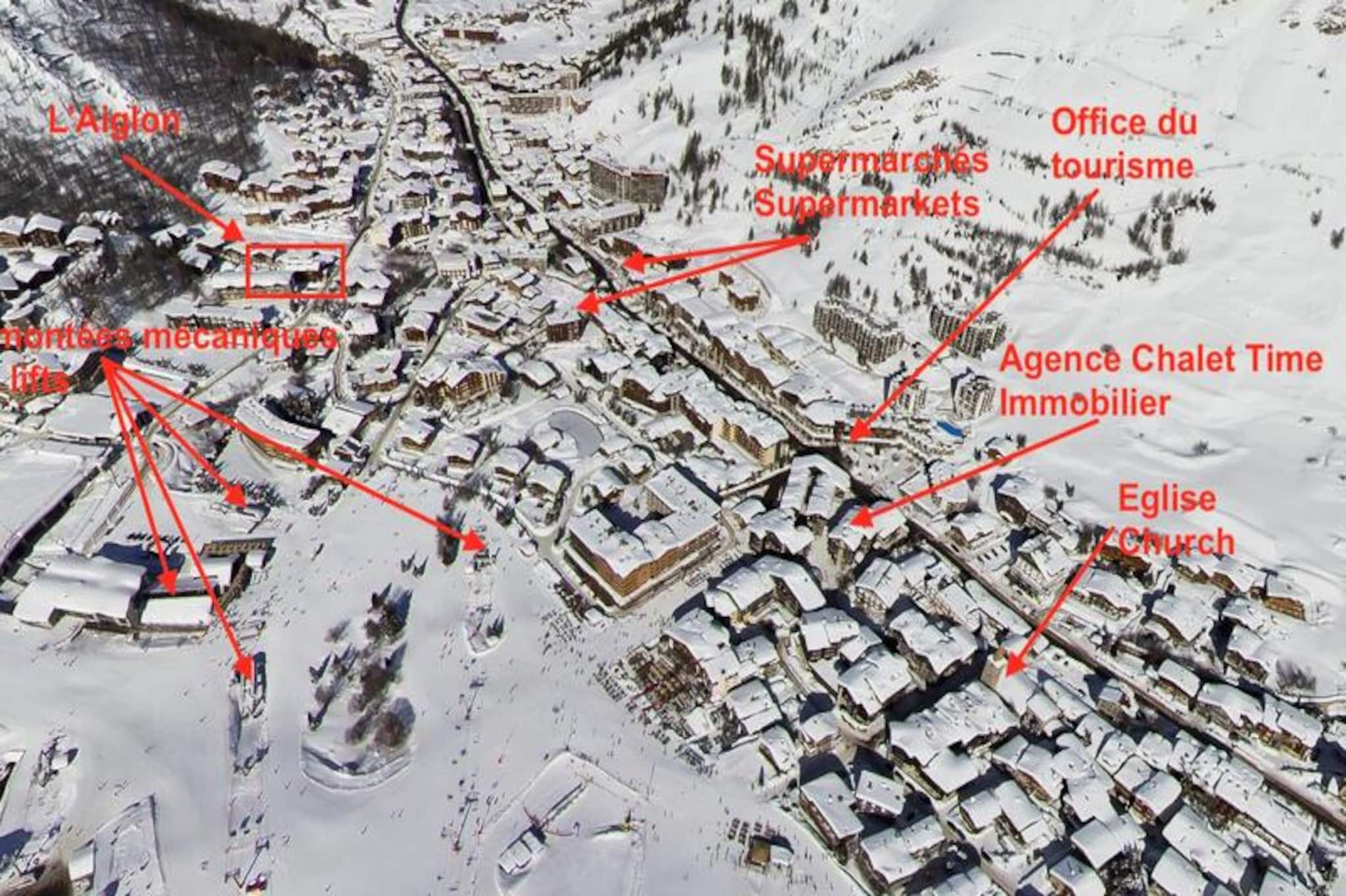 Amidst the breathtaking peaks of Val d'Isère, L'Aiglon offers an exceptional alpine retreat that seamlessly blends Savoyard charm with modern luxury. This beautifully crafted stone and wood chalet, located on the prestigious Route de la Balme, provides unparalleled access to the renowned Espace Killy ski area. With the Olympique cable car just 100 meters away, your skiing adventures begin almost at your doorstep, making it an ideal choice for winter sports enthusiasts. \n\nInside, the apartment exudes warmth and sophistication, with a spacious layout designed to accommodate up to six guests. The three bedrooms, each with its own bathroom, ensure privacy and comfort for families or groups. The open-plan kitchen flows effortlessly into the inviting living room, where natural light floods the space, creating a cozy ambiance. Modern amenities such as a 94\