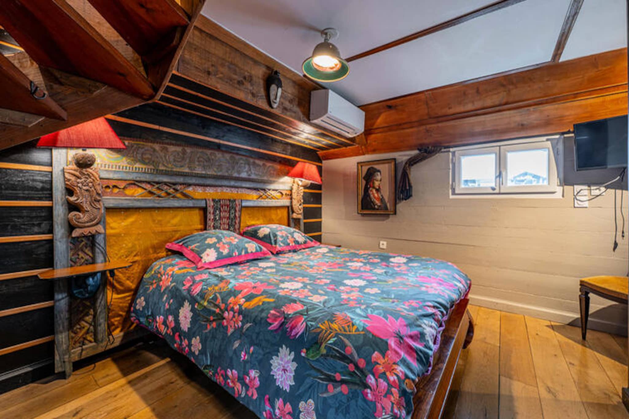 Step aboard the Petite Annick, a charming barge that blends timeless elegance with modern comfort, offering a truly unique stay on the tranquil waters of Bordeaux. Here, the gentle rhythm of the river sets the tone for your escape, while the peaceful quay provides a serene retreat in the heart of the city. From your private balcony, living room, or bedroom, soak in uninterrupted views of the harbor, creating a perfect backdrop for relaxation and inspiration. Whether you're sipping your morning coffee or watching the sunset from the rooftop's inviting four-poster bed, every moment feels like a dream.
Inside, the Petite Annick is thoughtfully designed to ensure your comfort. Enhanced cleaning and disinfection protocols are in place for your peace of mind. While breakfast is not served, your suite is stocked with delightful essentials including coffee, tea, milk, butter, jam, biscuits, fruit juice, and bottled water. The spacious living areas and cozy furnishings invite you to unwind and savor the unique ambiance of life on the water.
Located in the dynamic Bassins à Flots district, the barge is perfectly positioned to explore Bordeaux. Public transport options such as trams, buses, bicycles, and the Batcub river shuttle are all within a 10-minute walk, making it easy to discover the city's vibrant culture and historic charm. Free parking is available directly in front of the barge, and nearby rental services for bicycles, scooters, and e-scooters provide additional flexibility for your adventures.
Whether you're seeking a romantic getaway, a peaceful retreat, or a base to explore Bordeaux, the Petite Annick offers an unforgettable experience. Let the gentle waters and the city's allure create memories that will linger long after your stay.