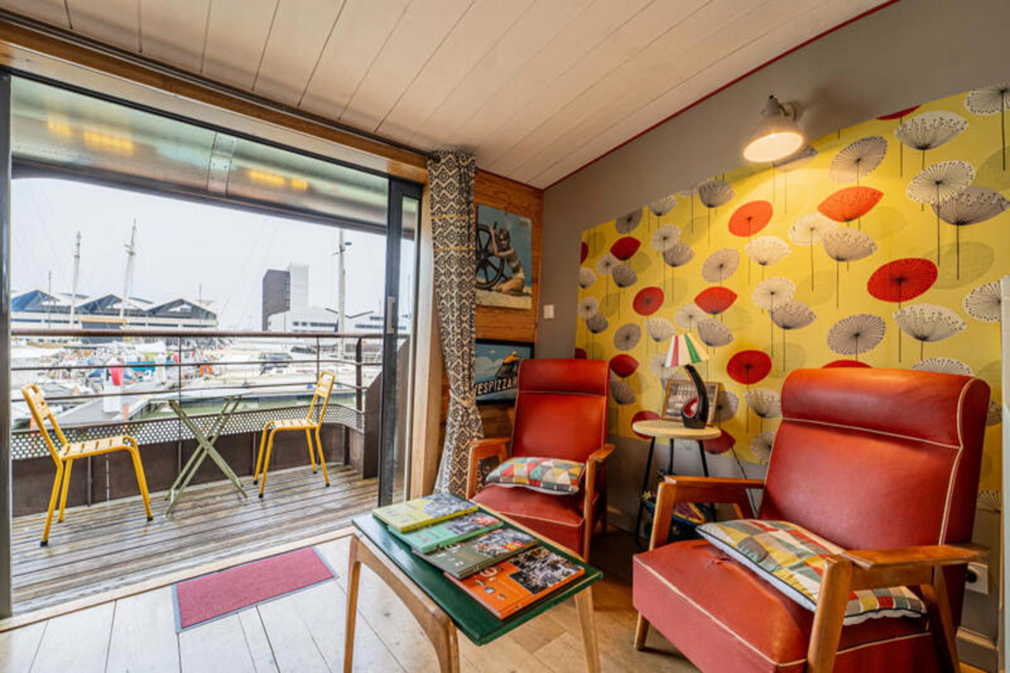 Floating serenely on a tranquil quay, this unique houseboat offers an enchanting escape in the heart of Bordeaux. Imagine waking up to the gentle sway of the water, with sunlight streaming through your window and the vibrant city just a short stroll away. This peaceful retreat combines the charm of riverside living with the convenience of urban proximity, making it the perfect getaway for couples, families, or friends seeking a memorable experience.
The houseboat features four charming duplex apartments, each thoughtfully designed for comfort and relaxation. Downstairs, you'll find an air-conditioned bedroom with a queen-size bed, a private bathroom, and a separate toilet. Upstairs, a cozy living area invites you to unwind, while modern amenities ensure a seamless stay. Step outside to enjoy the sunbathing area on the quay, complete with lounge chairs and a small pool crafted from a converted wine vat. A cozy dining space with a griddle and barbecue adds to the allure, perfect for al fresco meals by the water.
Located just steps from the town center, you'll have easy access to Bordeaux's lively atmosphere and cultural treasures. A short walk connects you to trams, buses, the Batcub river shuttle, and Vécubs carpooling services, making exploration effortless. Free parking is available right in front of the houseboat for added convenience. Whether you're savoring a quiet morning coffee or venturing into the vibrant city, this houseboat offers the best of both worlds.
Discover the magic of Bordeaux from this serene riverside haven, where every detail is designed to create lasting memories. With its unique charm, exceptional location, and thoughtful amenities, this houseboat promises an unforgettable stay.
