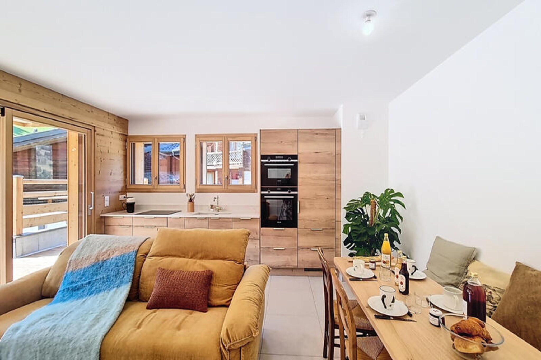 Surrounded by the serene beauty of the French Alps, this charming 39m² apartment in Les Gets is a haven for those seeking a cozy mountain retreat. Whether you're planning a family getaway or a trip with friends, this property offers the perfect blend of comfort and convenience, just steps away from the slopes. Imagine waking up to the crisp alpine air, gearing up, and being on the Turche ski lifts in just 120 meters or the Perrières slopes in 150 meters. The location ensures you’re always close to the action while still enjoying a peaceful escape. \n\nInside, the apartment exudes warmth and practicality. The open-plan living area is designed for relaxation, with a comfortable sofa bed and a cozy bedroom featuring a double bed, making it ideal for up to four guests. The fully equipped kitchen invites you to prepare hearty meals after a day on the slopes, complete with a coffee machine, oven, microwave, and dishwasher. Modern amenities like Wi-Fi keep you connected, while the private garage provides secure parking for your vehicle, adding an extra layer of convenience.\n\nLes Gets is not just about skiing; it’s a year-round destination with activities for everyone. In winter, enjoy the pristine slopes and après-ski charm, while summer brings hiking trails, mountain biking, and breathtaking alpine vistas. The village itself is a delightful mix of traditional Savoyard charm and modern amenities, with restaurants, shops, and cultural events to explore.\n\nWhether you’re here to carve through fresh powder or to unwind amidst stunning mountain scenery, this apartment offers an authentic alpine experience. Book your stay now and create unforgettable memories in the heart of the French Alps.