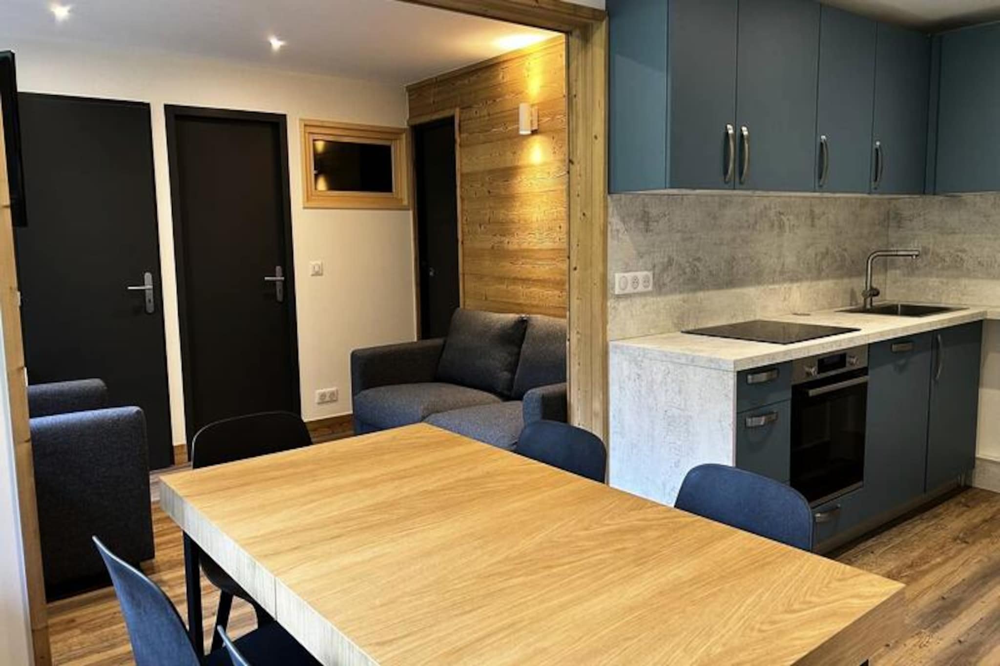 High above the Tarentaise Valley, where the crisp alpine air invigorates the senses, lies this beautifully renovated apartment in the heart of Plagne Bellecôte. With its prime location just steps from the Bellecôte Glacier gondola, this retreat offers the perfect balance of modern comfort and mountain charm, inviting you to explore the breathtaking landscapes of the French Alps. Whether you're here for the thrill of skiing or the tranquility of summer hikes, this property is your gateway to unforgettable adventures.
Inside, the 52m² apartment is thoughtfully designed to accommodate up to seven guests. The living area features a cozy sofa bed, a flat-screen television, and a large dining table perfect for family meals. The open-plan kitchen is fully equipped with modern appliances, including a dishwasher, oven, microwave, and coffee maker, ensuring you have everything you need to prepare hearty alpine feasts. Three inviting bedrooms provide flexible sleeping arrangements, including a double bed, bunk beds, and a unique bunk bed with a double base and single top. Two bathrooms and a separate toilet add convenience, while a ski locker ensures your gear is always ready for the slopes.
Step outside, and you'll find yourself immersed in the vibrant atmosphere of Plagne Bellecôte. At 1,930 meters above sea level, the resort offers a wealth of activities, from skiing and snowboarding in winter to hiking, tennis, and swimming in summer. The nearby Bellecôte Glacier, soaring to 3,450 meters, is a must-see for nature enthusiasts and adventure seekers alike. Shops, restaurants, and services are all within easy reach, making your stay as seamless as it is memorable.
Whether you're carving through fresh powder, exploring alpine trails, or simply unwinding in the comfort of your mountain retreat, this apartment promises a holiday filled with relaxation, excitement, and the timeless beauty of the French Alps.