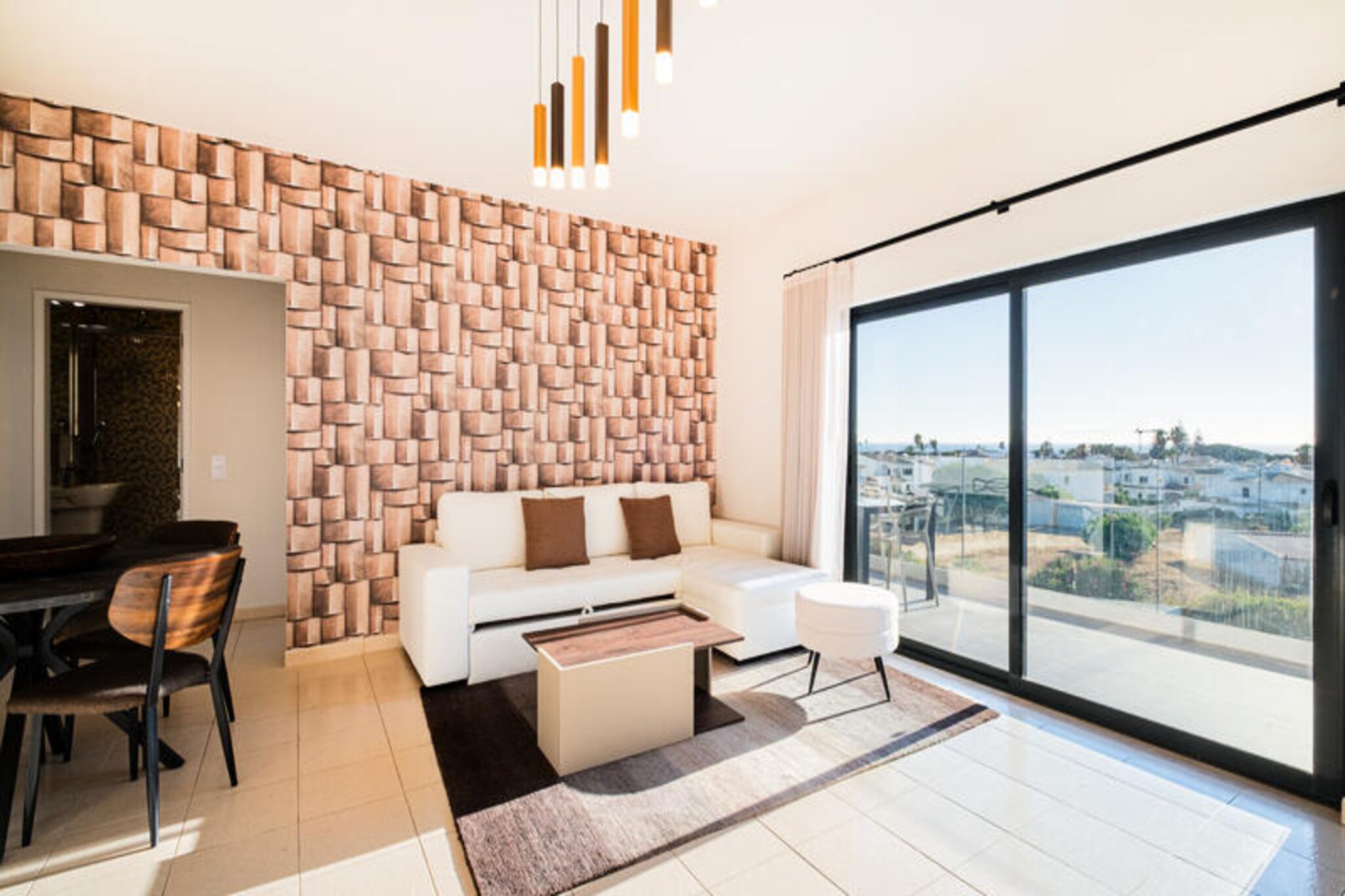 A short stroll from the golden sands of Galé Beach, Casa Galé Mar offers a harmonious blend of modern comfort and Algarve charm. This elegant villa is divided into three independent apartments, each thoughtfully designed to provide a serene and welcoming retreat. Whether you’re waking up to the gentle sound of the ocean or enjoying a quiet evening under the Algarve sky, this property invites you to relax and savor every moment of your stay.
Each apartment features two bright and airy bedrooms, a cozy yet contemporary living room, a fully equipped modern kitchen, and a private bathroom. The tasteful décor combines modern elegance with warm touches, creating a space that feels both stylish and inviting. The villa’s private swimming pool, surrounded by sun loungers and lush greenery, is the perfect spot to unwind after a day of exploring the region. With ample space and privacy, Casa Galé Mar is ideal for families or groups of friends traveling together.
Located just steps from Galé Beach, the villa is perfectly positioned to enjoy the best of the Algarve. Nearby, you’ll find a variety of restaurants serving fresh seafood, local markets, and supermarkets for all your essentials. For those seeking adventure, the vibrant town of Albufeira is just a short drive away, offering lively nightlife, historic charm, and a host of activities. Nature lovers will appreciate the scenic walking trails and breathtaking coastal views that define this region.
Casa Galé Mar is more than just a place to stay—it’s a gateway to the beauty and tranquility of the Algarve. Whether you’re here to relax by the pool, explore the stunning coastline, or indulge in the local cuisine, this villa promises an unforgettable holiday experience.