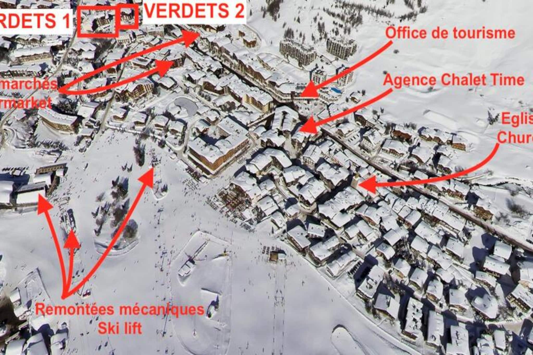 Amidst the serene charm of Val d'Isère, Résidence des Verdets offers a tranquil retreat just moments from the lively heart of the resort. Situated on a quiet street near the bus station, this residence ensures peace and convenience, with shops, restaurants, and ski rentals all within easy reach. The slopes are a mere 400 meters away, easily accessible via the free and frequent shuttle services, Red Train and Yellow Train, making it an ideal base for your alpine adventures. Wake up to the crisp mountain air and enjoy the ease of exploring one of France’s most renowned ski destinations. \n\nApartment V27, located on the second floor, is thoughtfully designed for up to four guests. Recently renovated and tastefully redecorated, it features two cozy bedrooms, two modern bathrooms, and a comfortable living room equipped with a flat-screen TV, DVD player, and stereo system. The kitchen is fully equipped with an induction hob, oven, dishwasher, refrigerator, washing machine, and both espresso and filter coffee makers, ensuring a seamless stay. Relax on the east-facing balcony with your morning coffee or unwind on the north-facing balcony after a day on the slopes. Additional amenities include a ski locker, Wi-Fi, and mid-stay cleaning services, all included for your comfort. \n\nBeyond the residence, Val d'Isère beckons with its vibrant après-ski scene. Indulge in local flavors at nearby restaurants like La Baraque and L'Arbre de Vie, or enjoy drinks and entertainment at Le XV, Coin des Amis, and Le Doudoune Club. For ski rentals, INTERSPORT Front de Neige MATTIS offers special rates, ensuring you’re well-equipped for your adventures. Whether you’re here for the thrill of skiing or the charm of the village, Résidence des Verdets promises an unforgettable alpine escape.