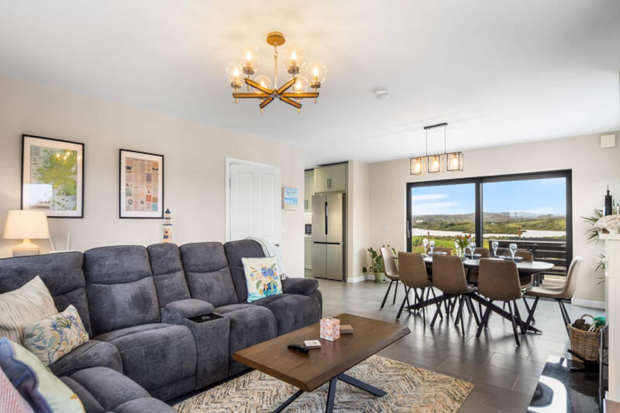 On the rugged coastline of Ballyconneely, where the Atlantic waves meet the serene Irish countryside, this charming holiday home offers a tranquil retreat for families and friends. Surrounded by breathtaking landscapes and just a short drive from the famous Connemara Championship Golf Links, it’s the perfect base to explore the natural beauty of Ireland’s west coast. Whether you’re seeking peaceful walks along the shore or adventurous days in the wild, this home invites you to experience it all. 

Inside, the house is thoughtfully designed to accommodate up to eight guests across four cozy bedrooms. The 105 m² space is both inviting and practical, featuring a fully equipped electric kitchen with modern appliances, including a refrigerator, dishwasher, and coffee maker, making meal preparation a breeze. The living area is warm and welcoming, with central heating and a TV for relaxed evenings in. Additional conveniences such as a washing machine, dryer, and Wi-Fi ensure a comfortable stay, while the garden with outdoor furniture and a barbecue provides the perfect setting for al fresco dining on sunny days. 

Ballyconneely’s stunning surroundings are yours to explore. Discover pristine beaches, rugged cliffs, and the nearby Connemara National Park, or take a scenic drive to the charming town of Clifden for its lively pubs and local crafts. For golf enthusiasts, the renowned links course is a must-visit, while anglers and nature lovers will appreciate the area’s rich fishing spots and wildlife. 

Whether you’re drawn by the allure of the Atlantic, the charm of Irish hospitality, or the promise of unforgettable landscapes, this Ballyconneely retreat is your gateway to a truly magical escape.