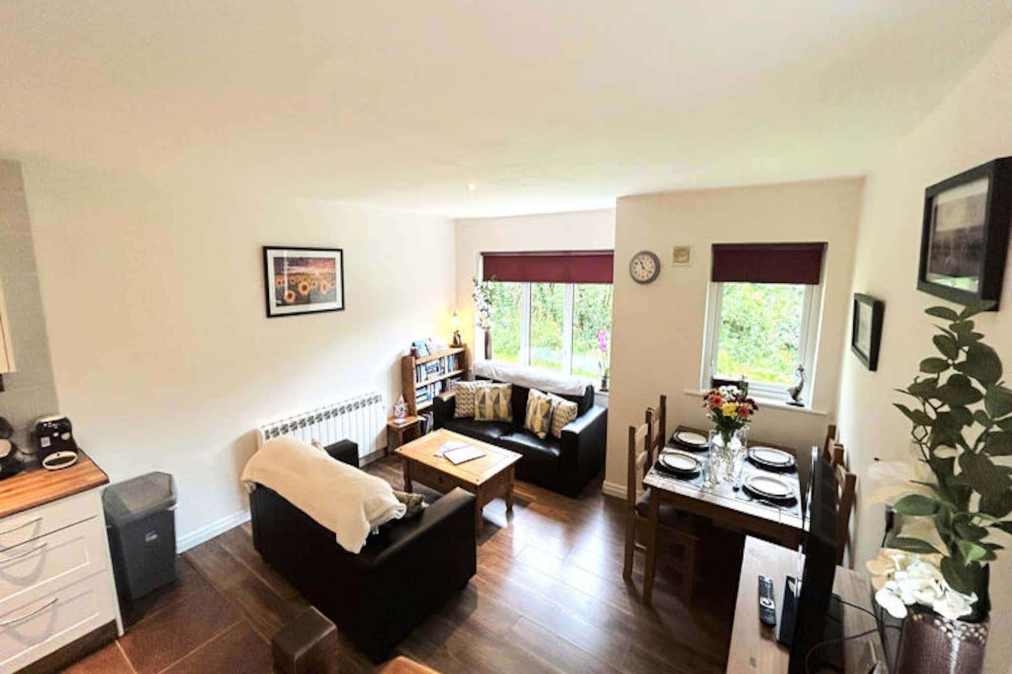 Surrounded by the rugged beauty of Connemara, this charming rural cottage in Clifden offers a tranquil retreat for those seeking to immerse themselves in Ireland’s natural splendor. With the Owenglin River just a short stroll away, the property invites you to unwind amidst serene landscapes, where the gentle sound of flowing water and the vibrant hues of the countryside create a picturesque setting for your getaway. Whether you’re planning a romantic escape or a family adventure, this cozy haven is the perfect base to explore the treasures of the Wild Atlantic Way.  
                      Inside, the cottage boasts two welcoming bedrooms and accommodates up to four guests, making it ideal for small groups or families. The 85 m² space is thoughtfully designed with comfort in mind, featuring modern amenities such as Wi-Fi, electric heating, and a television for your convenience. The American-style kitchen is fully equipped with everything you need to prepare delicious meals, including a refrigerator, oven, microwave, and dishwasher. After a day of exploring, relax in the inviting living area or enjoy a peaceful evening outdoors with the nearby children’s play area and tennis court adding to the charm.  
                      Located just 2 km from Clifden Town, you’ll find a variety of dining options, including Mannions Seafood Bar and Signal Bar & Restaurant, as well as supermarkets like Aldi and Lidl for all your essentials. Venture further to discover stunning beaches such as Eyrephort and Bunowen, or explore the breathtaking Connemara National Park, only 16 km away. Golf enthusiasts will appreciate the proximity to Connemara Golf Links, while nature lovers can revel in the beauty of Dogs Bay and Omey Beach.  
                      Whether you’re drawn to the rugged coastline, the vibrant town atmosphere, or the tranquil countryside, this Clifden cottage offers a perfect blend of comfort and adventure. Create lasting memories in one of Ireland’s most enchanting regions.