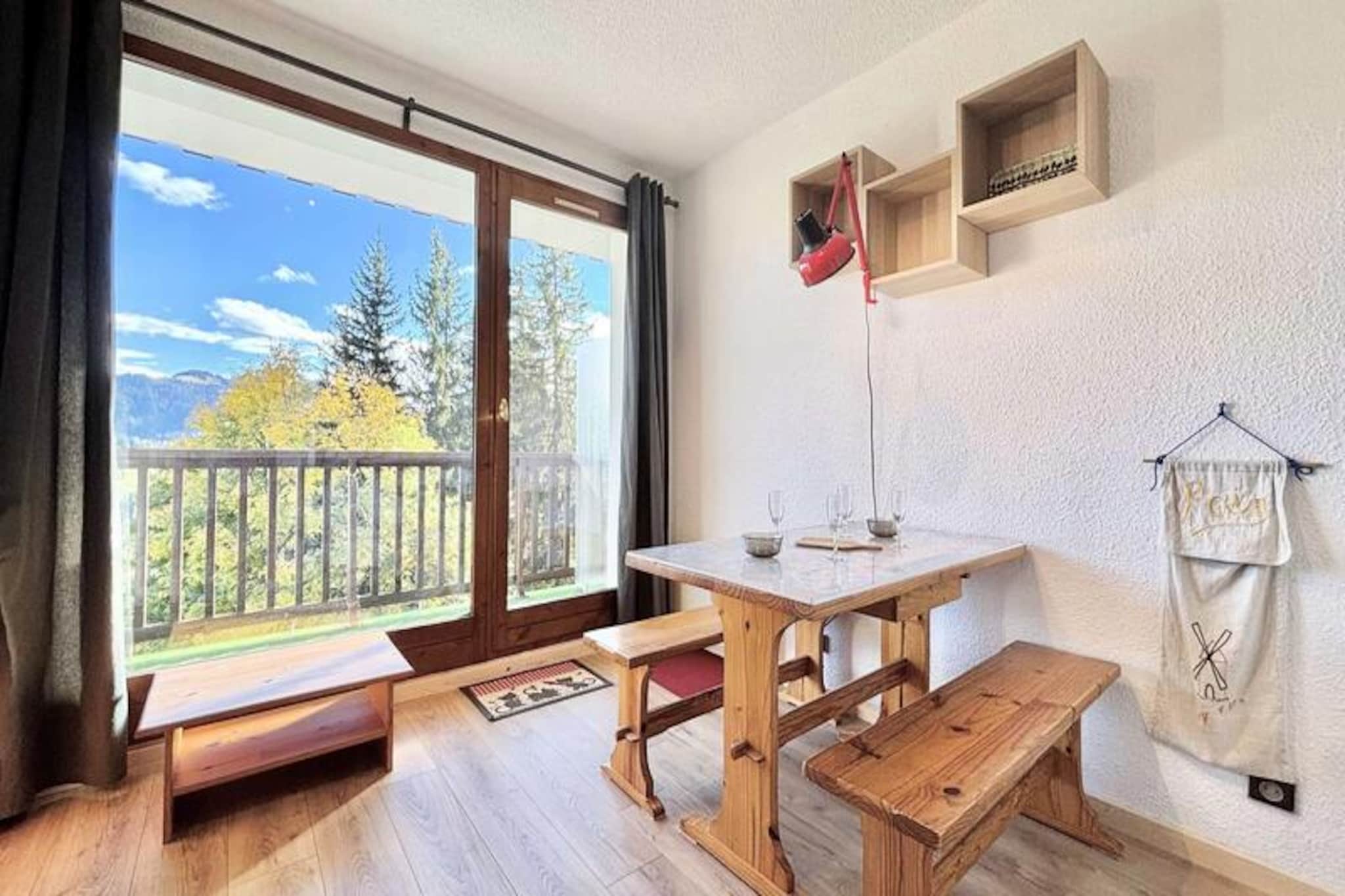 High above the serene landscapes of Notre-Dame-de-Bellecombe, this charming studio apartment offers a cozy retreat with breathtaking views of Mont Rond. Imagine waking up to the warmth of sunlight streaming through your south-facing balcony, as the majestic alpine panorama unfolds before your eyes. Whether you're seeking thrilling days on the slopes or tranquil evenings surrounded by nature, this property provides the perfect base for your mountain getaway. 
                      Compact yet thoughtfully designed, the 19 m² studio features an inviting living room with a comfortable sofa bed, a practical kitchenette for preparing hearty meals, and a bathroom with all essentials. The entrance includes two bunk beds, ideal for families or small groups, though the upper bunk is not suitable for children under six. A ski locker ensures your gear is always ready, while the unreserved outdoor parking space adds convenience to your stay. 
                      Located just 100 meters from the Espace Diamant ski slopes via a snow-covered path, this apartment places you at the heart of winter sports excitement. For everyday needs, a mini-market and a pizzeria are only 600 meters away, while the charming village center of Notre-Dame-de-Bellecombe is easily accessible by car, free shuttle, or even skis. In summer, the area transforms into a haven for hikers and nature enthusiasts, with trails that showcase the beauty of the French Alps. 
                      Whether you're here for skiing, hiking, or simply unwinding amidst stunning scenery, this studio invites you to experience the magic of the mountains in every season.