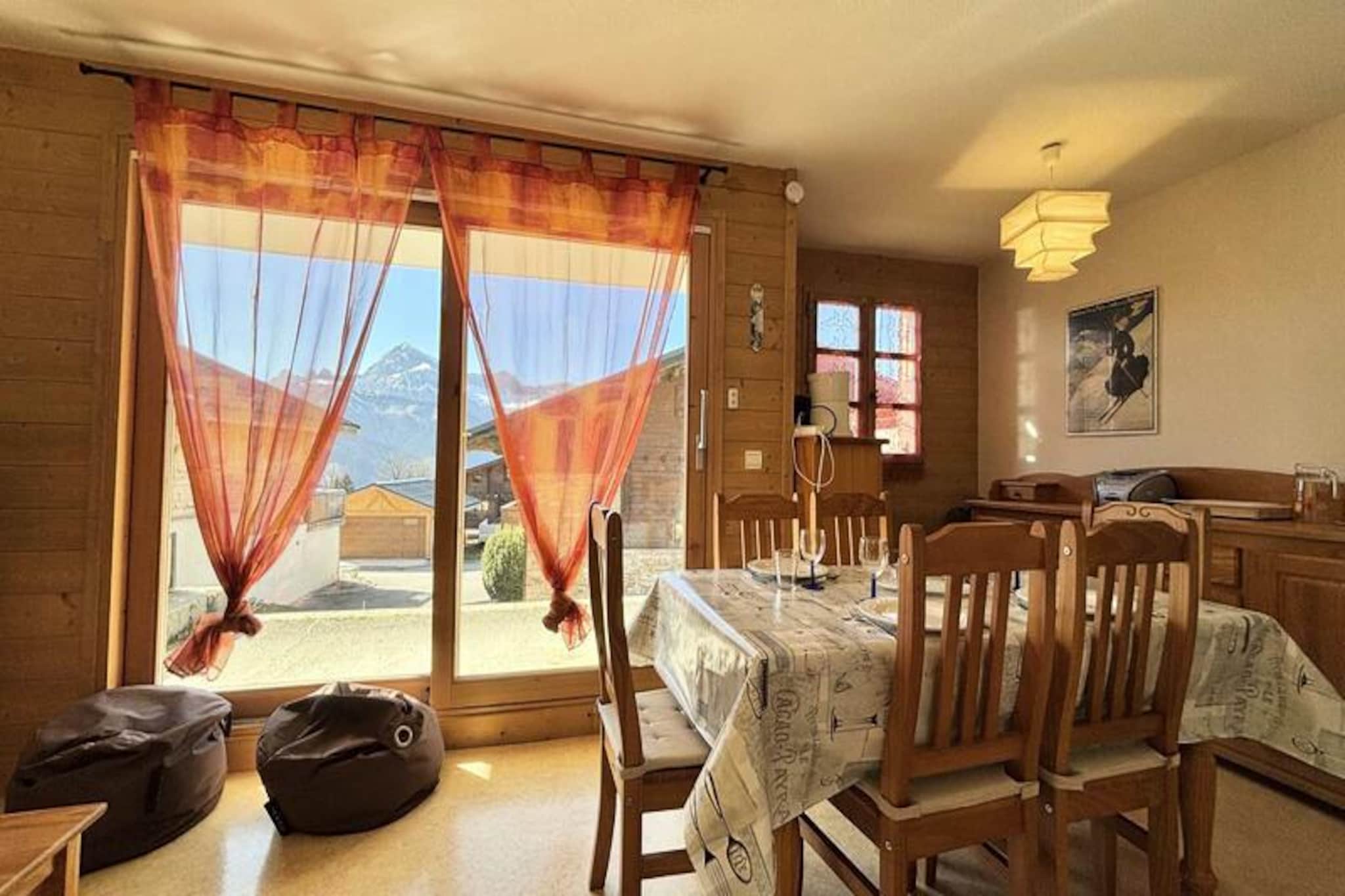 Awaken to the crisp alpine air and the serene beauty of the French Alps in this delightful ground-floor apartment in Les Arcs 1800. Perfectly situated for ski enthusiasts, the property offers direct ski-in/ski-out access, ensuring effortless entry to the slopes. Whether you're here for winter adventures or summer escapes, this charming retreat invites you to immerse yourself in the natural splendor of the Tarentaise Valley. Step onto the terrace and let the mountain views inspire your day ahead. \n\nInside, the 39 m² apartment is thoughtfully designed to accommodate up to four guests. The cozy bedroom features a comfortable double bed, while the cabin provides two bunk beds, ideal for families or small groups (note: the top bunk is not suitable for children under 6). The living room is a welcoming space to relax, with easy access to the terrace for outdoor moments. A fully equipped kitchen allows you to prepare meals with ease, complemented by a bathroom and separate toilet for added convenience. Guests also benefit from a private garage in the basement and a ski locker, making your stay both practical and stress-free. \n\nThe location is unbeatable, with village shops just a short stroll away, offering everything from fresh local produce to après-ski essentials. In winter, the slopes beckon, while summer transforms the area into a haven for hiking, cycling, and exploring the nearby Vanoise National Park. Bourg-Saint-Maurice and the iconic Aiguille Rouge are just a drive away, promising unforgettable alpine adventures. \n\nWhether you're seeking thrilling ski days or tranquil evenings surrounded by mountain charm, this apartment is your gateway to the best of Les Arcs. Create lasting memories in a setting that combines comfort, convenience, and the timeless allure of the Alps.